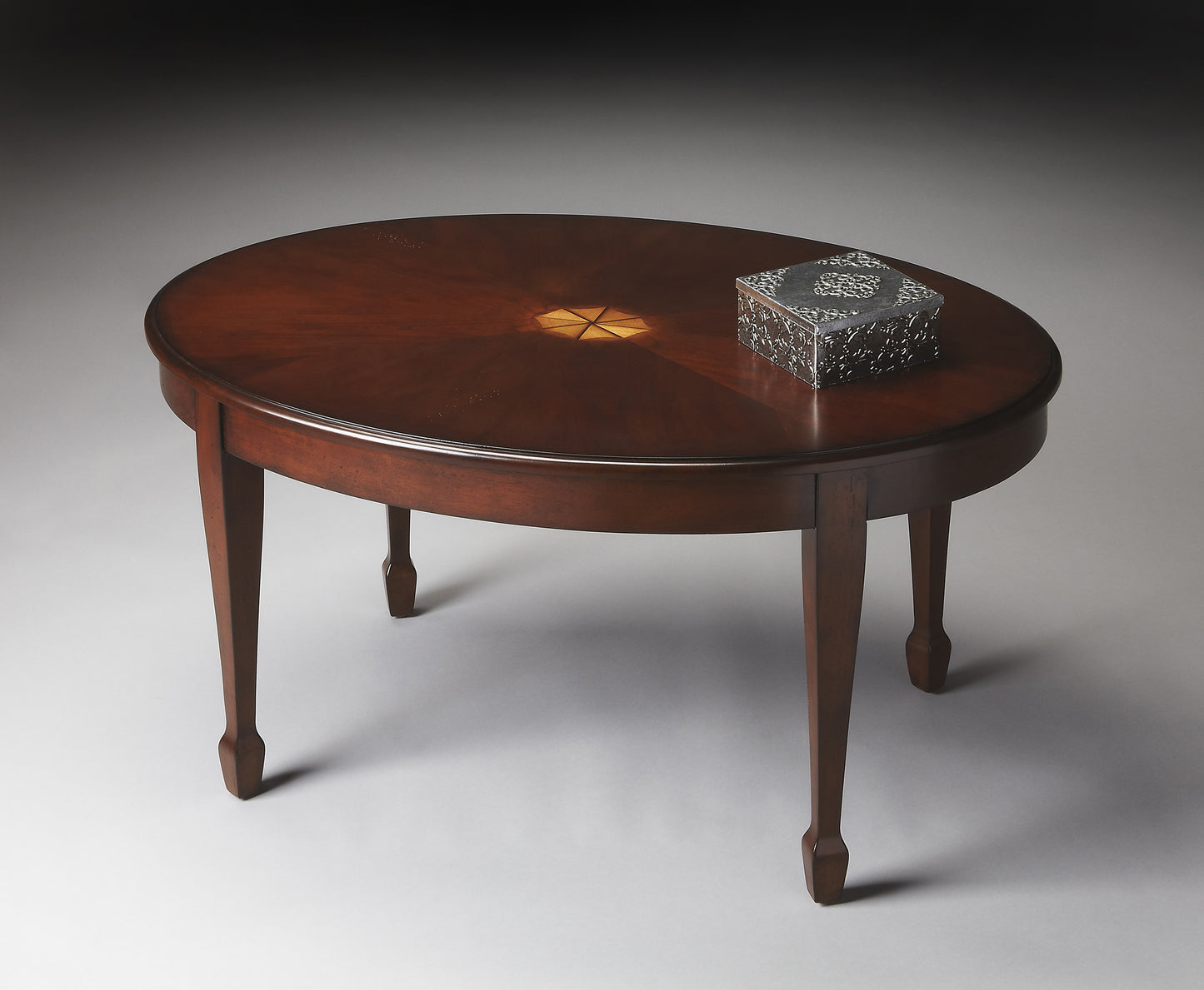 Butler Specialty Company Clayton 38 in. W Oval Wood Coffee Table with Veneer Linen-Fold Inlay, Dark Brown