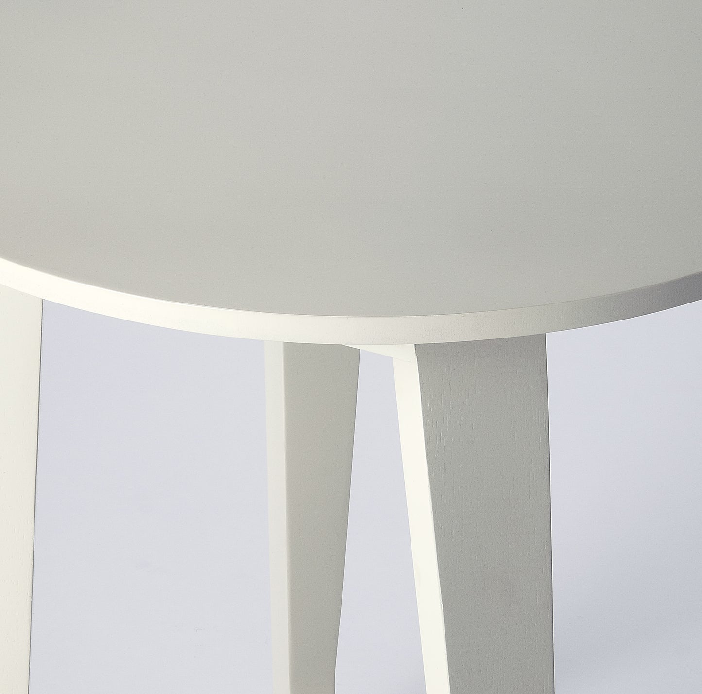 Butler Specialty Company Devin 19.5 in. W Round Solid Wood Mid Century Side Table with 2 Sled Legs, White