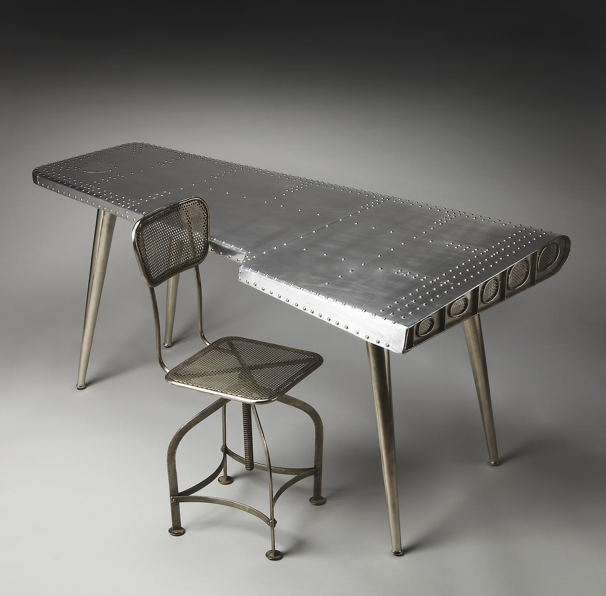Butler Specialty Company Midway 65.5 in. W Triangular Metal and Wood Aviator Themed Desk, Silver