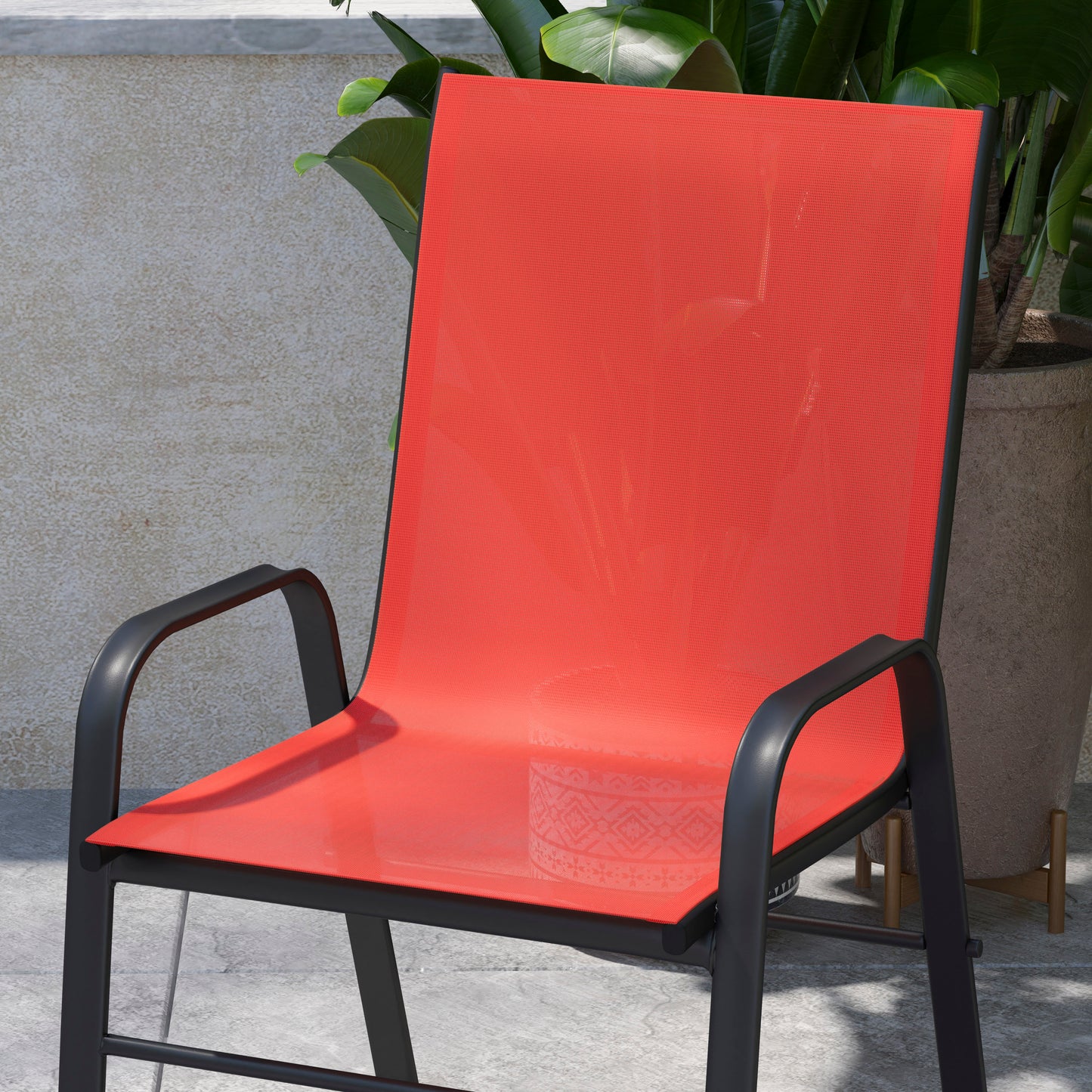 4 Pack Brazos Series Black Outdoor Stack Chair with Flex Comfort Material and Metal Frame Red