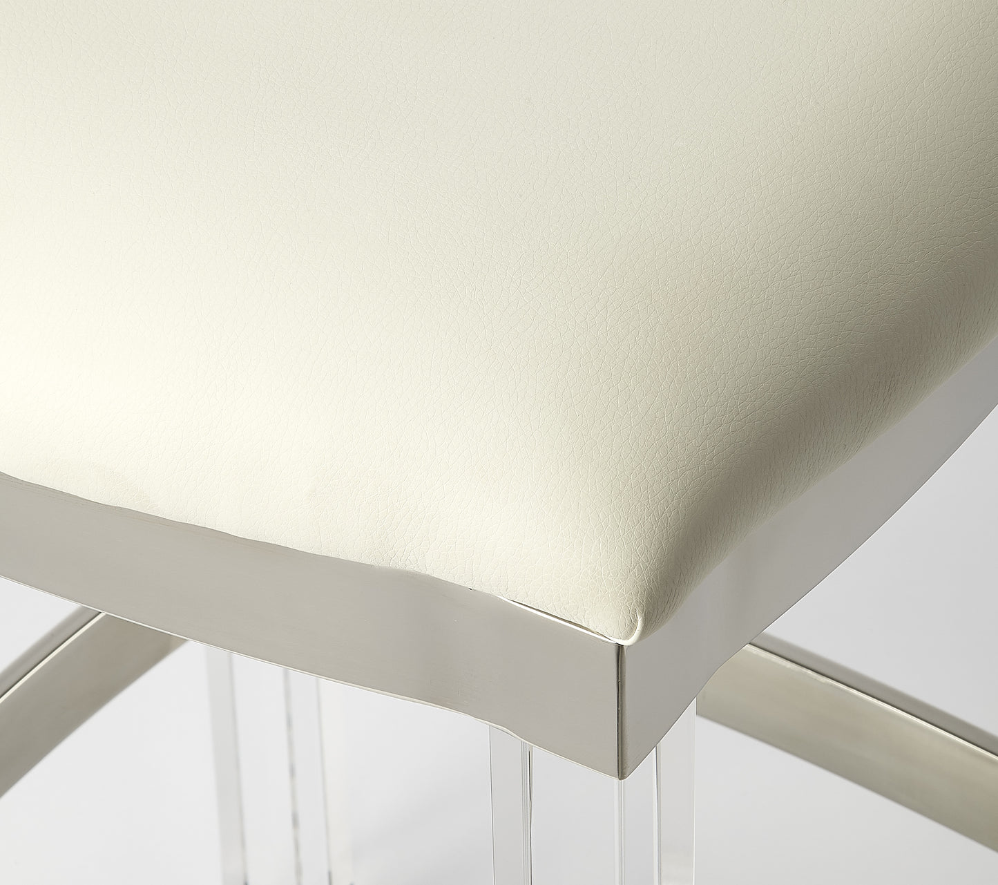 Butler Specialty Company Jordan 24 in. Seat Height Faux Leather and Acrylic Backless Counter Stool with Foot Rest, White