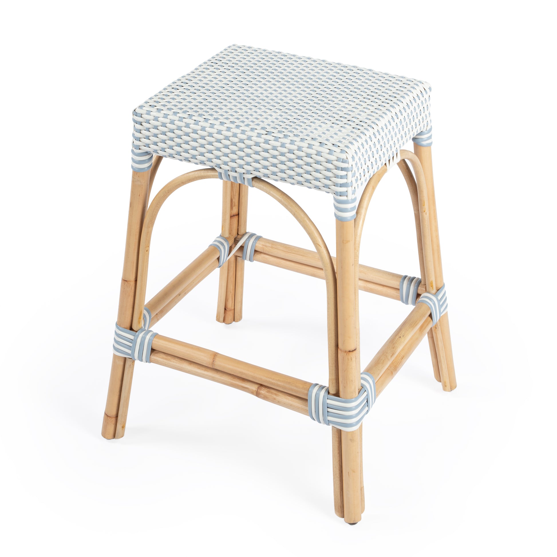 Butler Specialty Company Robias 24.5 in. Seat Height Rectangular Rattan Backless Counter Stool with Footrest, White and Sky Blue Dot