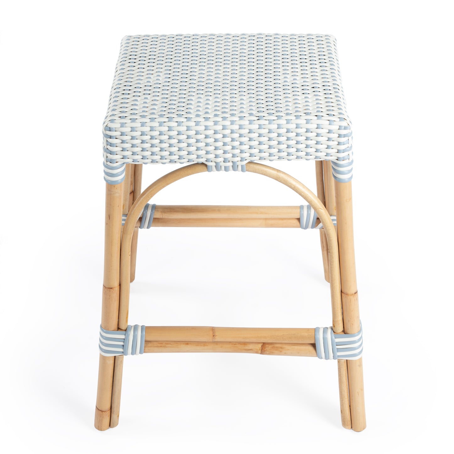 Butler Specialty Company Robias 24.5 in. Seat Height Rectangular Rattan Backless Counter Stool with Footrest, White and Sky Blue Dot