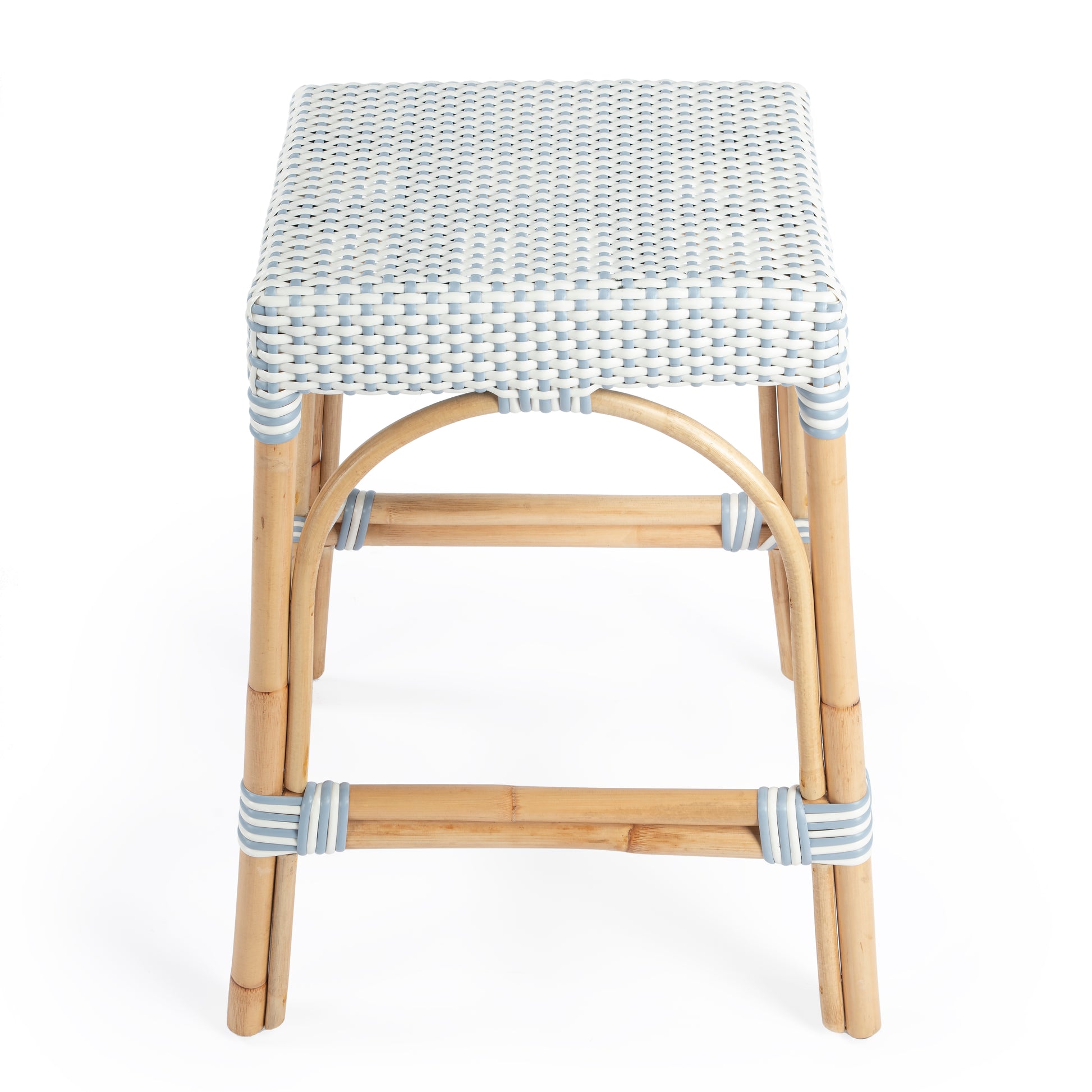 Butler Specialty Company Robias 24.5 in. Seat Height Rectangular Rattan Backless Counter Stool with Footrest, White and Sky Blue Dot