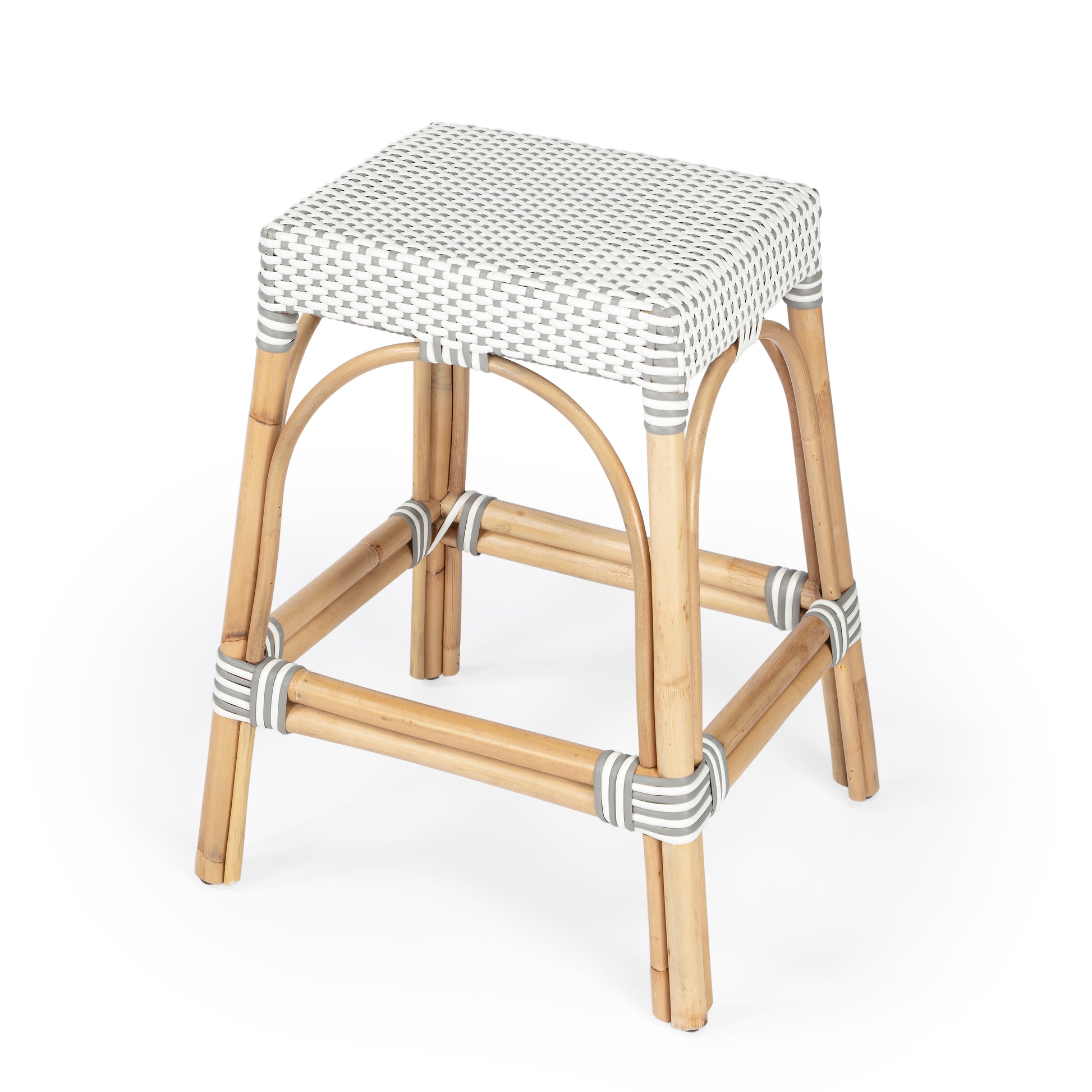Butler Specialty Company Robias 24.5 in. Seat Height Rectangular Rattan Backless Counter Stool with Footrest, Gray and White Dot