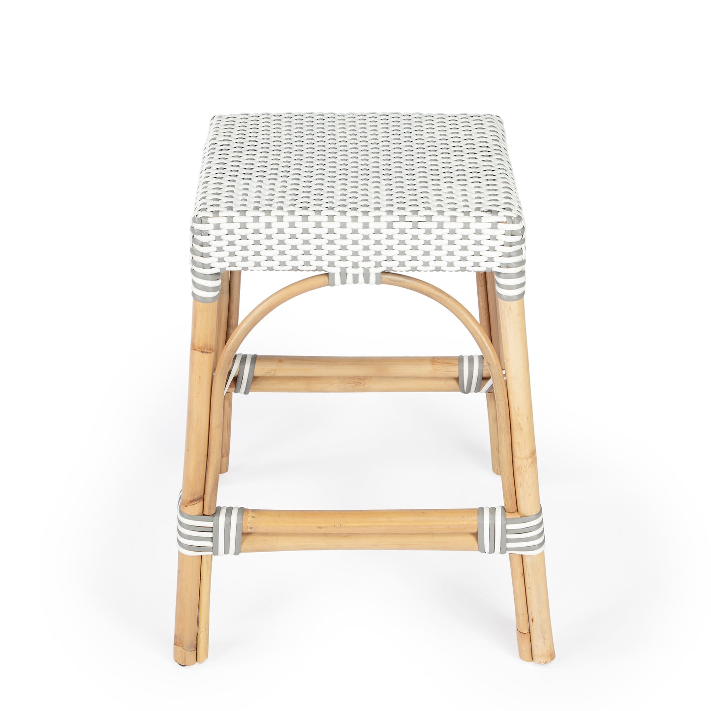 Butler Specialty Company Robias 24.5 in. Seat Height Rectangular Rattan Backless Counter Stool with Footrest, Gray and White Dot