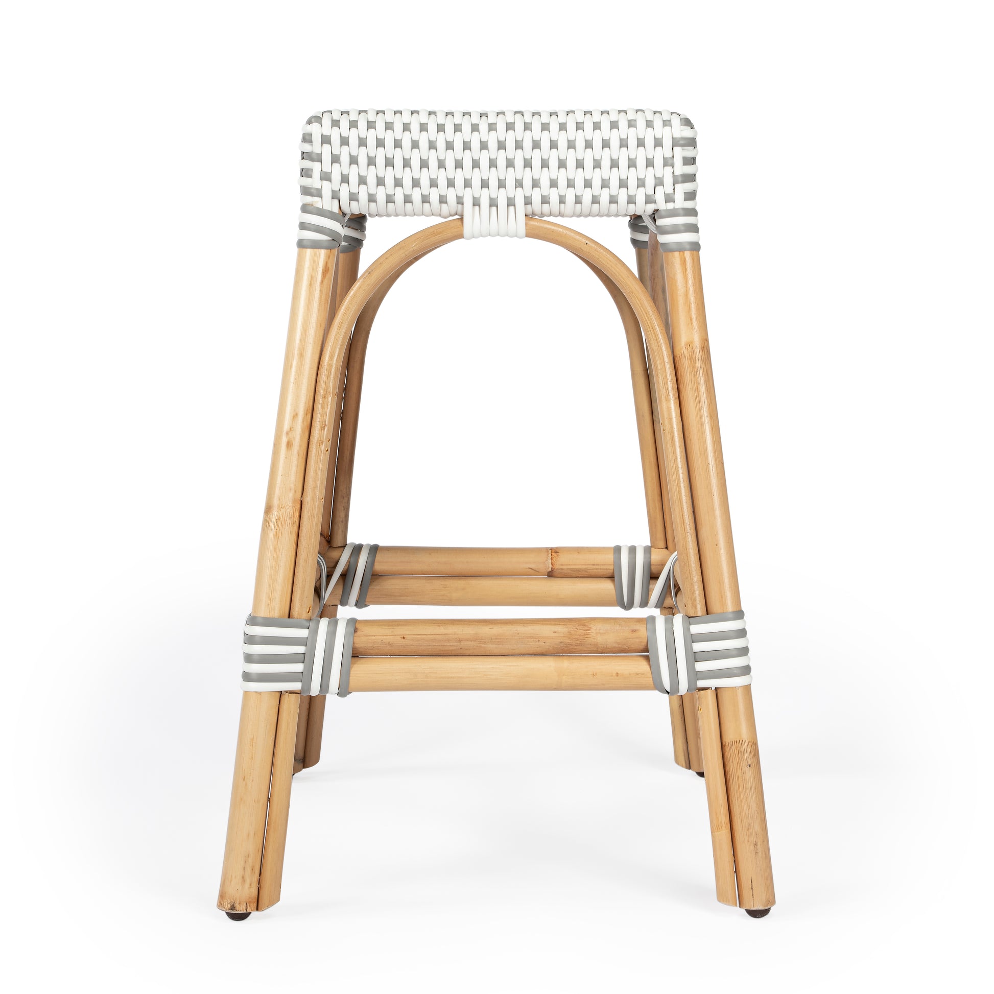 Butler Specialty Company Robias 24.5 in. Seat Height Rectangular Rattan Backless Counter Stool with Footrest, Gray and White Dot