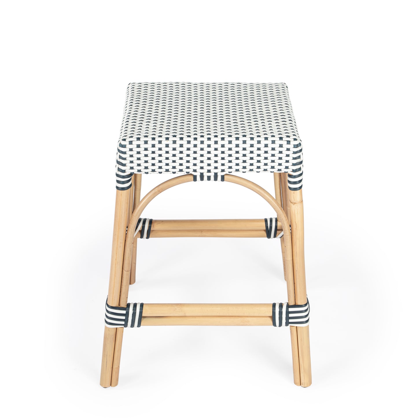 Butler Specialty Company Robias 24.5 in. Seat Height Rectangular Rattan Backless Counter Stool with Footrest, White and Navy Dot