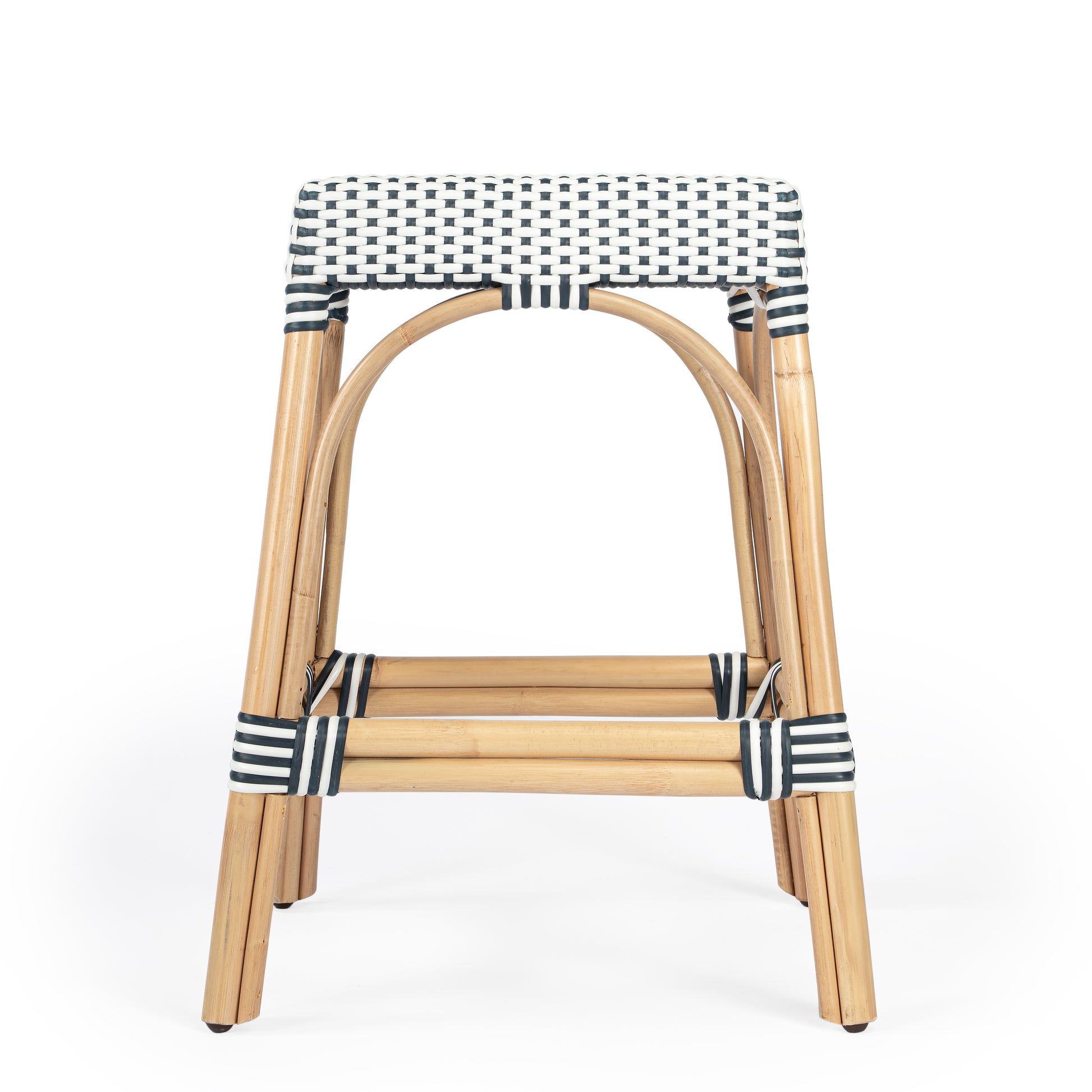 Butler Specialty Company Robias 24.5 in. Seat Height Rectangular Rattan Backless Counter Stool with Footrest, White and Navy Dot