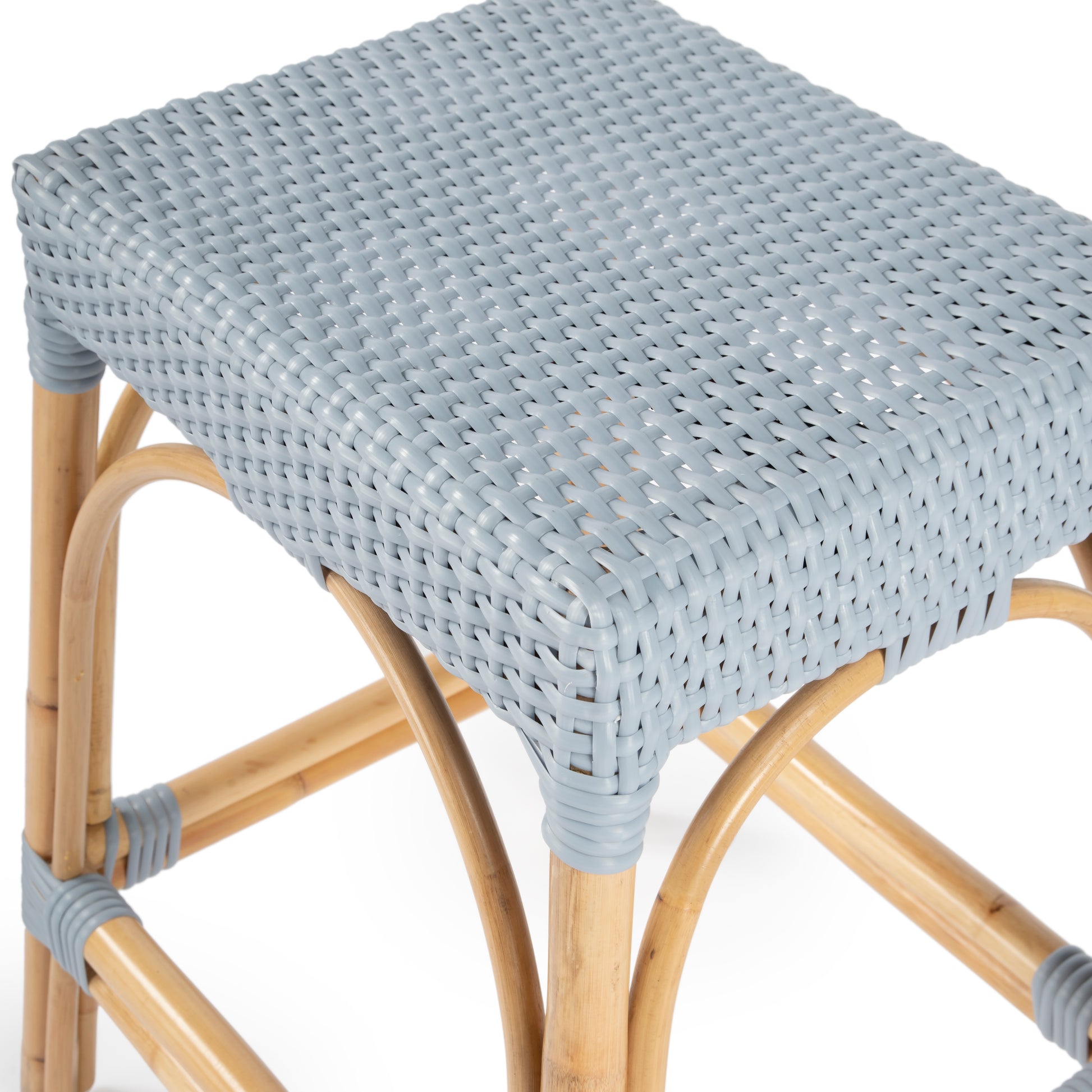 Butler Specialty Company Robias 24.5 in. Seat Height Rectangular Rattan Backless Counter Stool with Footrest, Baby Blue