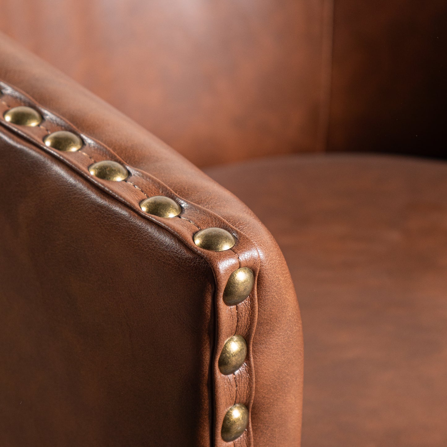 Myles Club Style Commercial Barrel Accent Armchair with 360° Swivel Metal Base and Brown Leathersoft Upholstery with Brass Decorative Nail Head Trim Brown