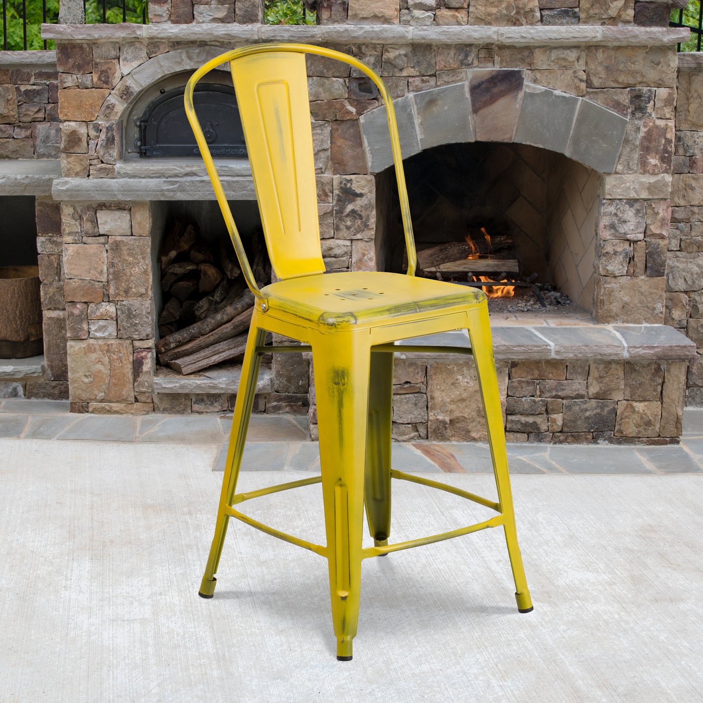 Carly Commercial Grade 24" High Distressed Yellow Metal Indoor-Outdoor Counter Height Stool with Back Yellow