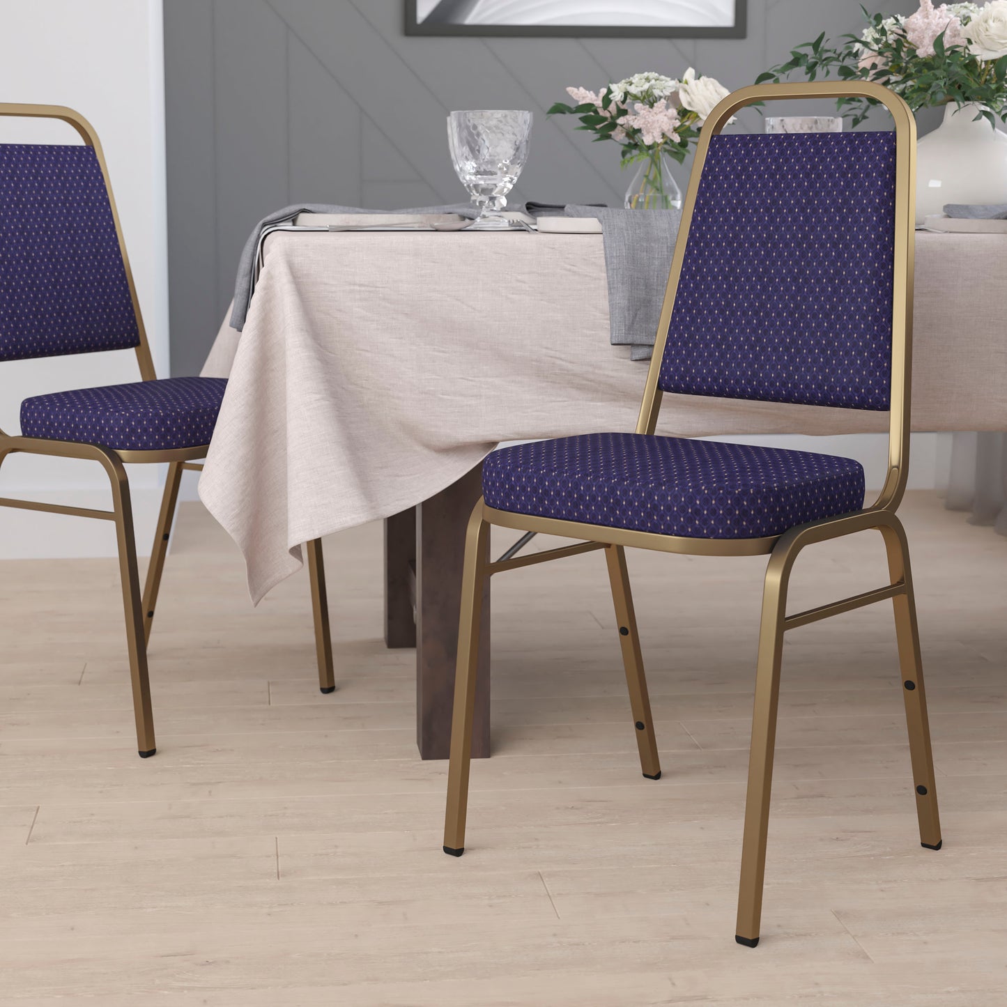 HERCULES Series Trapezoidal Back Stacking Banquet Chair in Navy Patterned Fabric - Gold Frame Navy Patterned Fabric/Gold Frame
