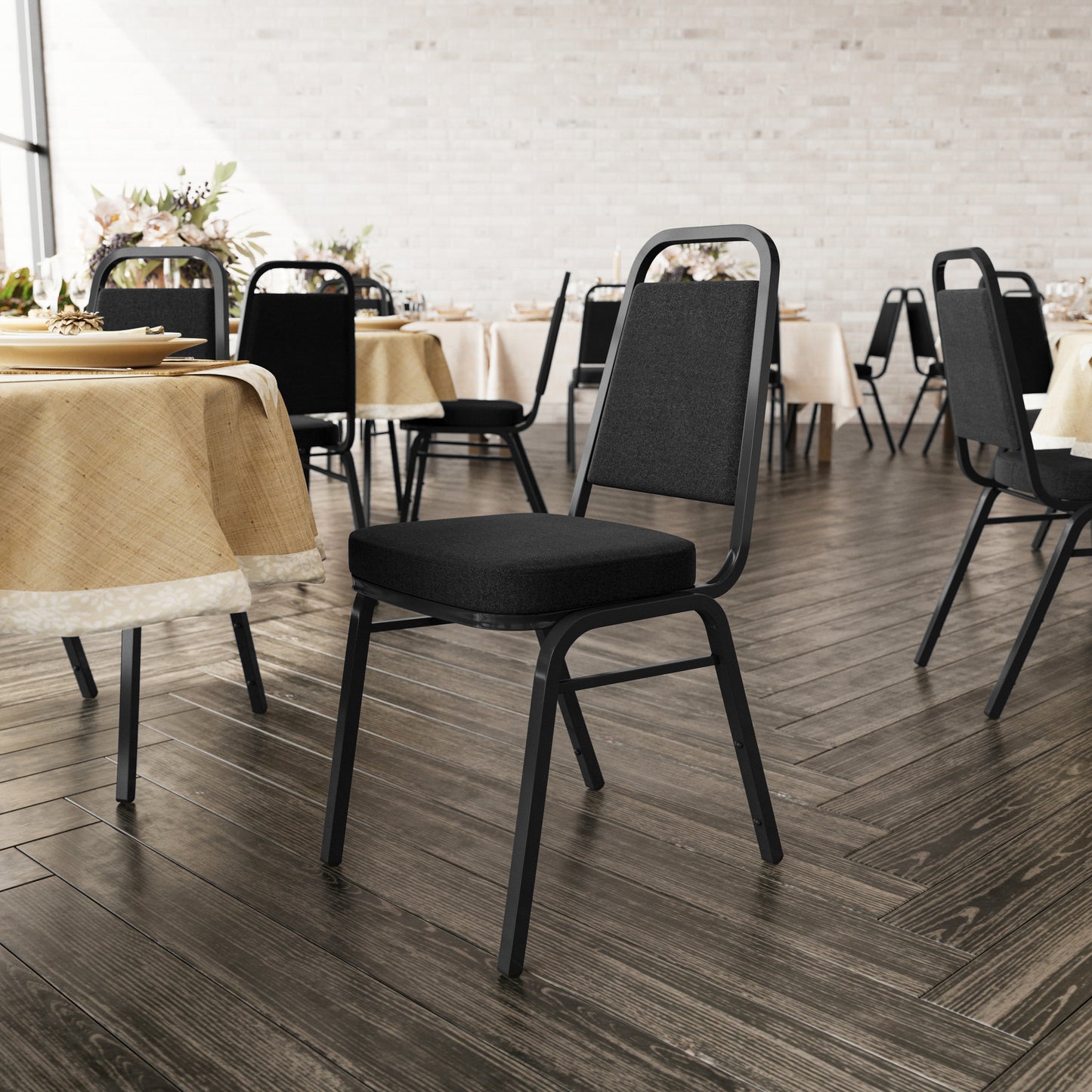 HERCULES Series Trapezoidal Back Stacking Banquet Chair with Black Fabric and 2.5'' Thick Seat - Black Frame Black Fabric/Black Frame