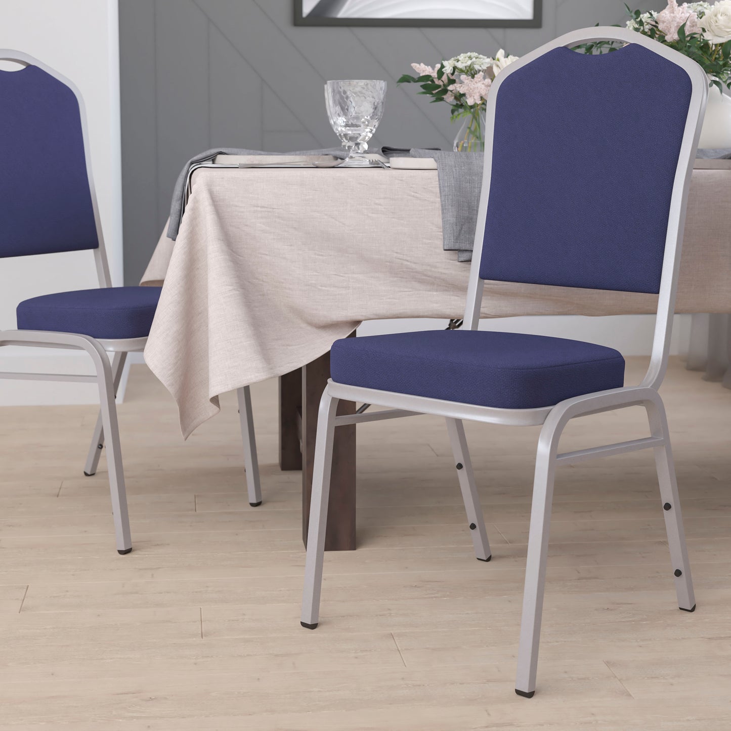 HERCULES Series Crown Back Stacking Banquet Chair in Navy Fabric - Silver Frame Navy Fabric/Silver Frame