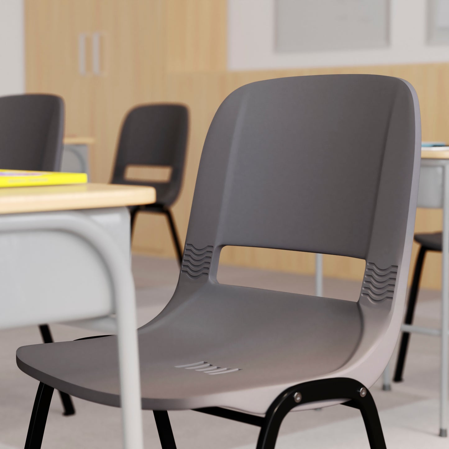 HERCULES Series 661 lb. Capacity Gray Ergonomic Shell Stack Chair with Black Frame and 16'' Seat Height Gray Plastic/Black Frame RUT-16-PDR-GY-GG