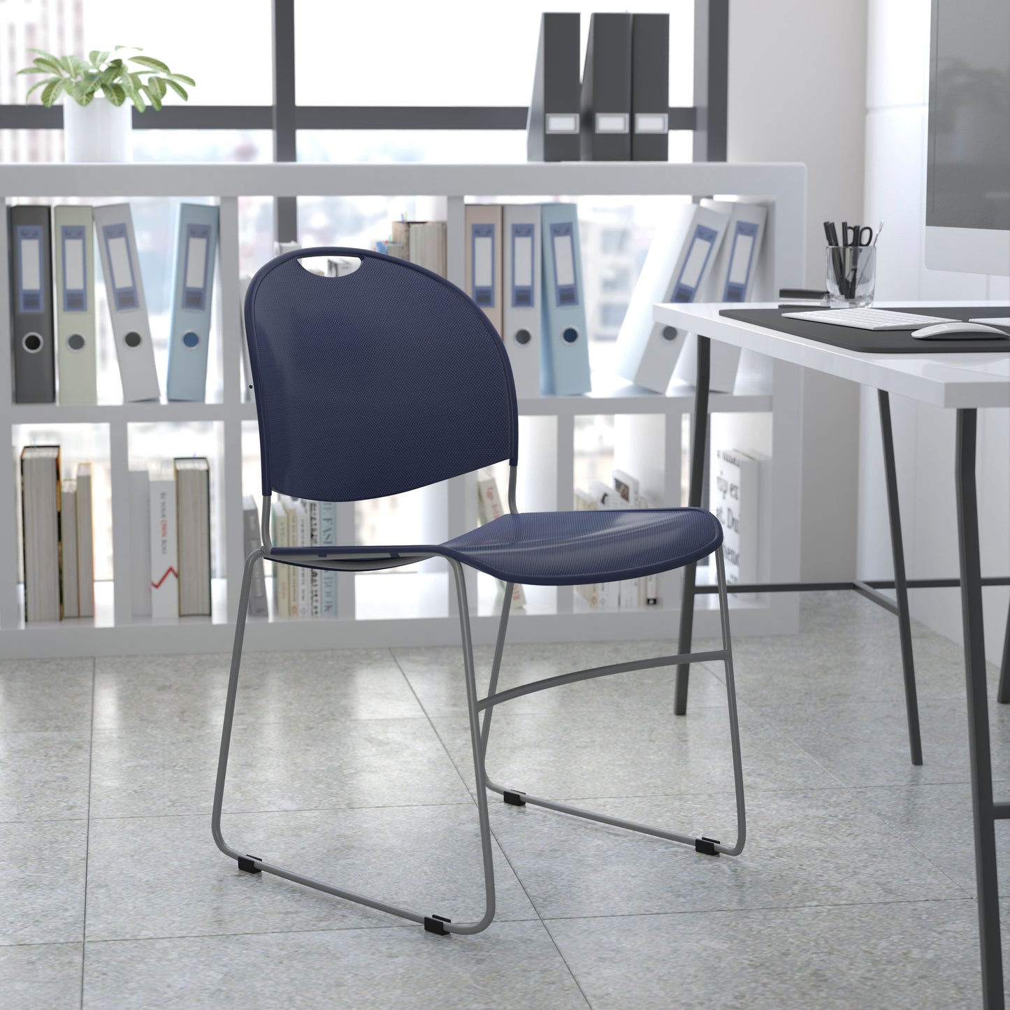 HERCULES Series 880 lb. Capacity Navy Ultra-Compact Stack Chair with Silver Powder Coated Frame Navy Plastic/Silver Frame RUT-188-NY-GG
