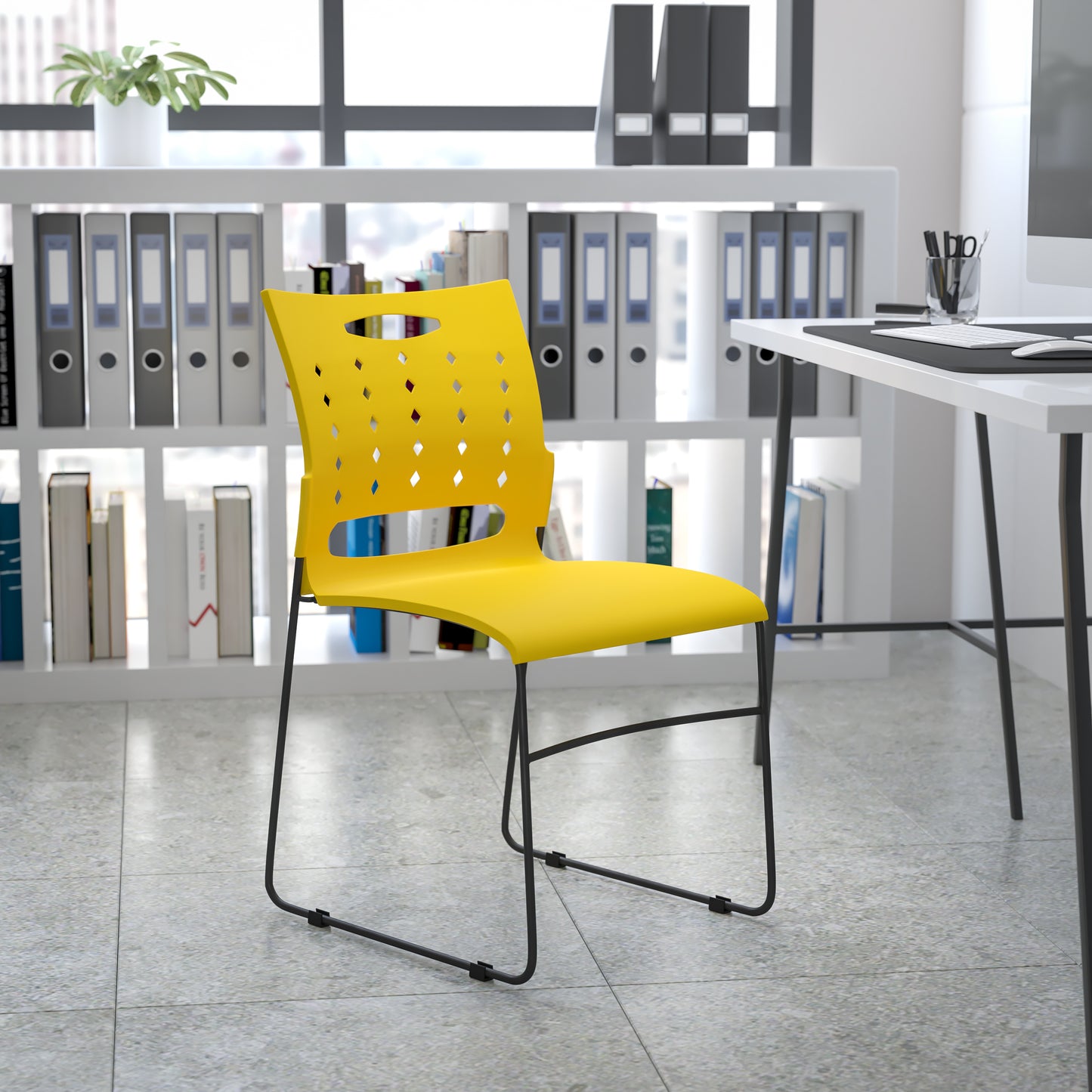 HERCULES Series 881 lb. Capacity Yellow Sled Base Stack Chair with Air-Vent Back Yellow RUT-2-YL-GG