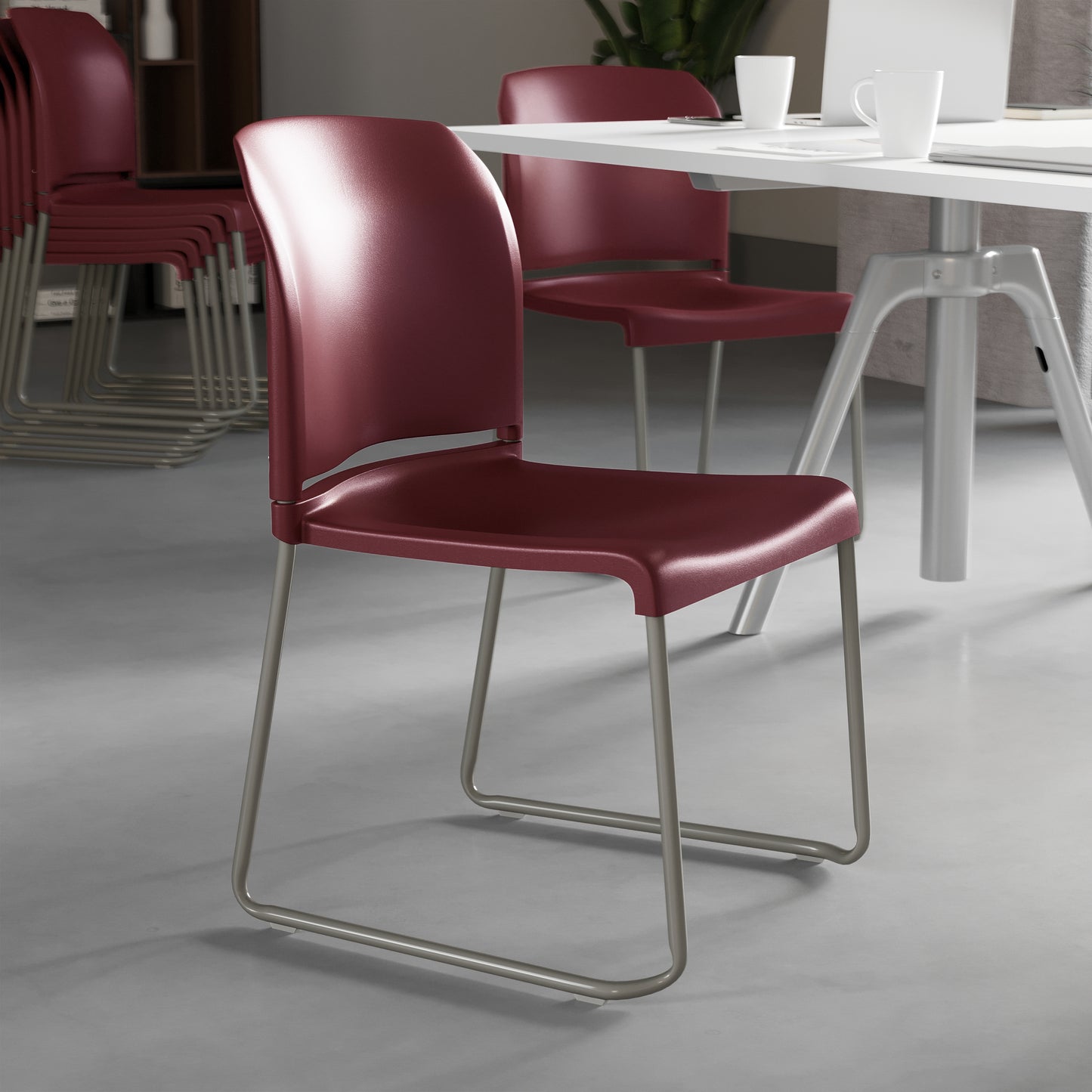 HERCULES Series 880 lb. Capacity Burgundy Full Back Contoured Stack Chair with Gray Powder Coated Sled Base Burgundy