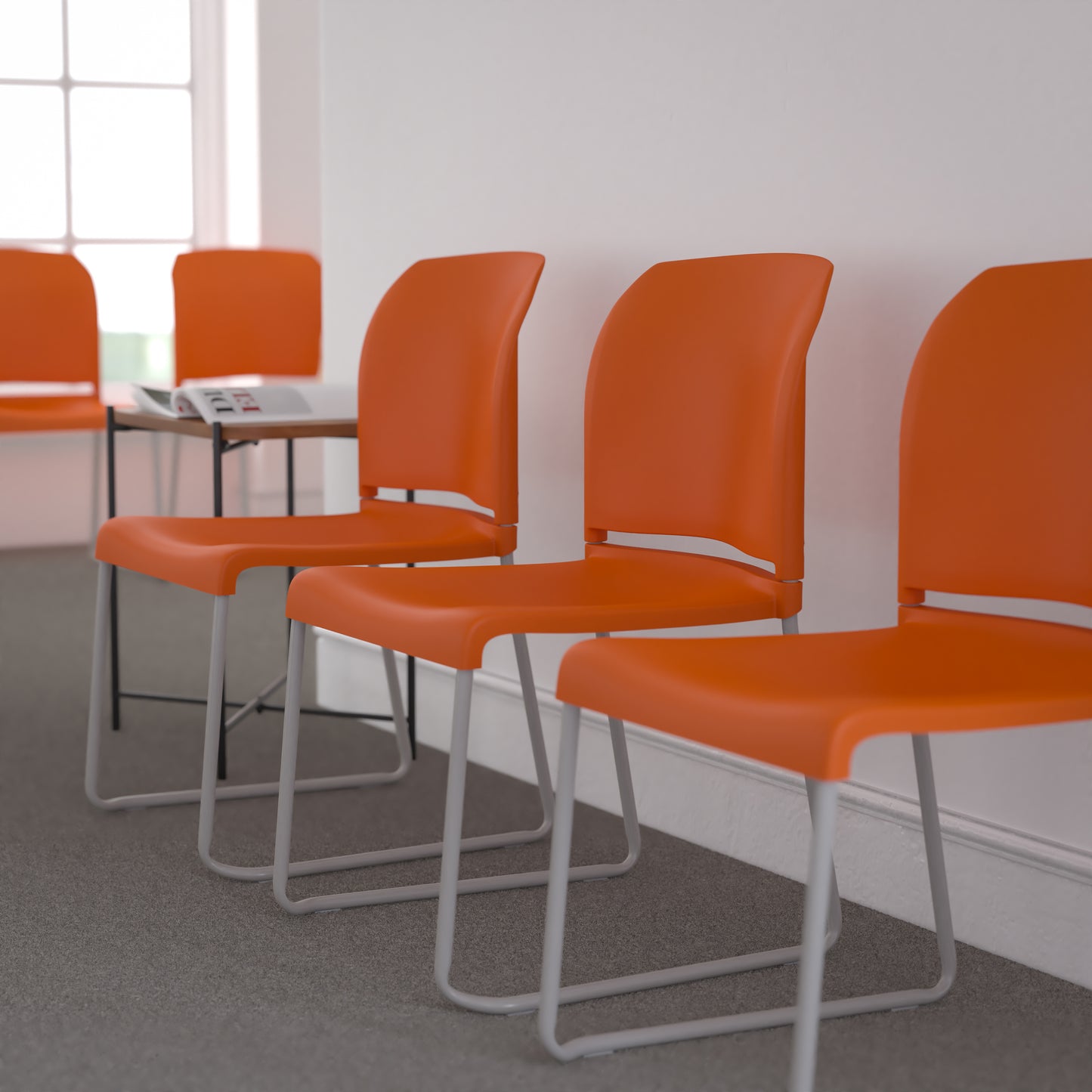 HERCULES Series 880 lb. Capacity Orange Full Back Contoured Stack Chair with Gray Powder Coated Sled Base Orange