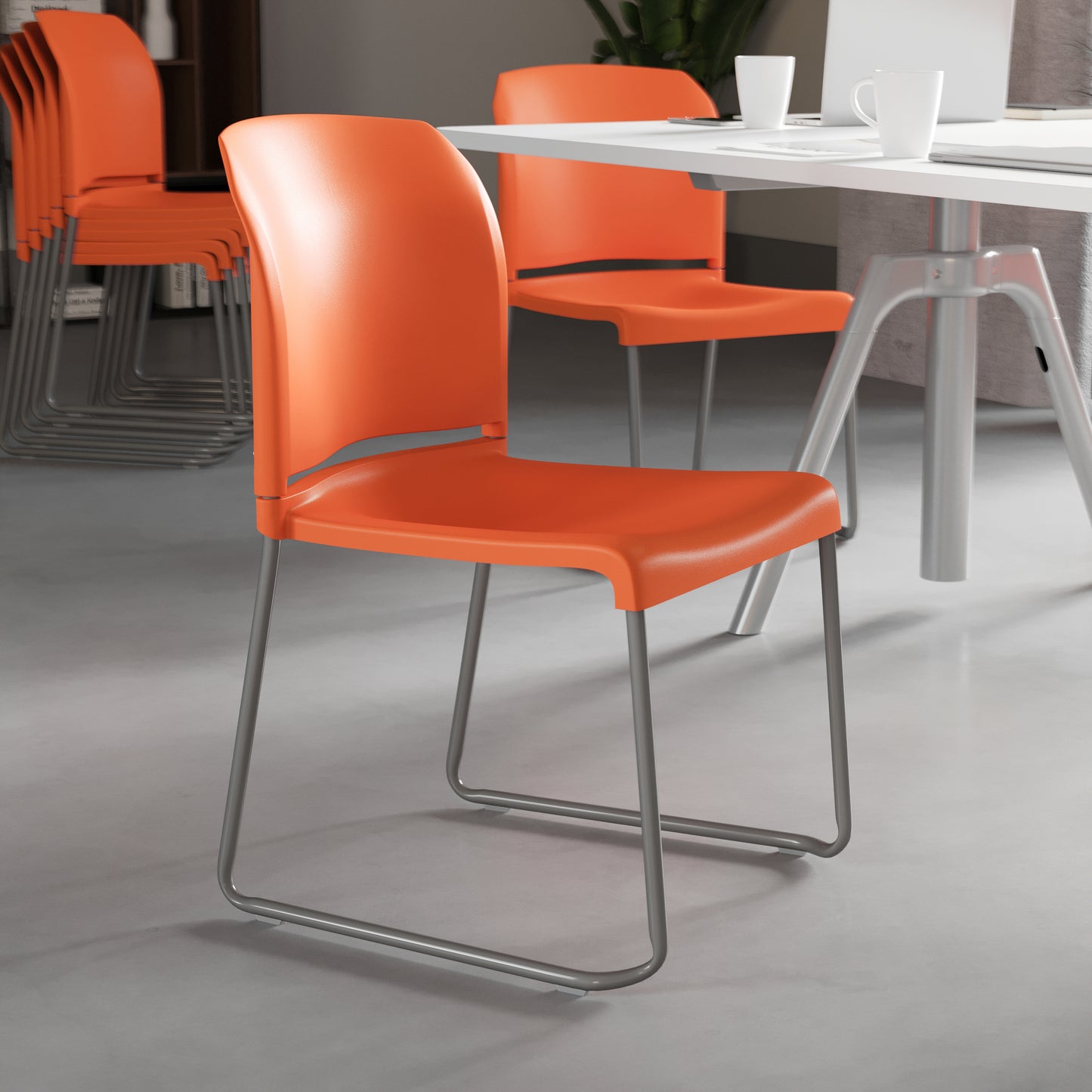 HERCULES Series 880 lb. Capacity Orange Full Back Contoured Stack Chair with Gray Powder Coated Sled Base Orange