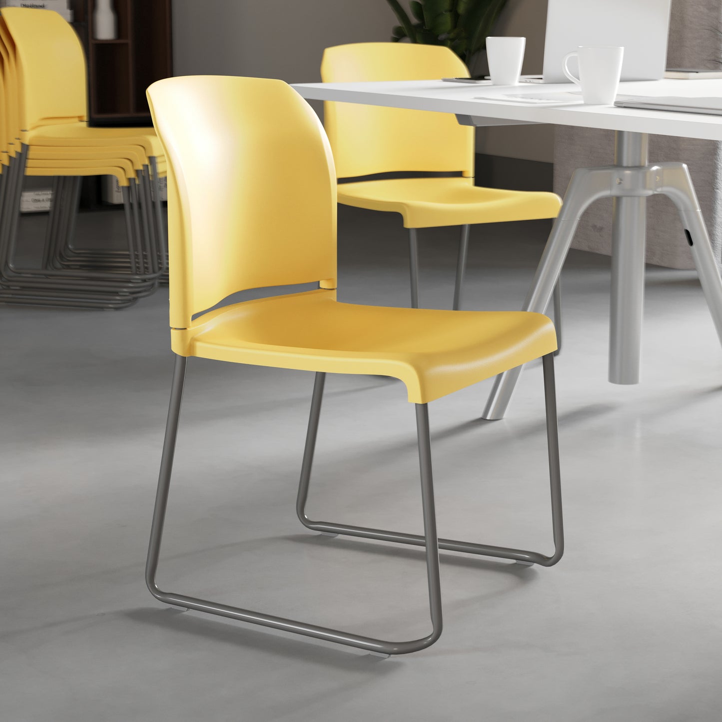 HERCULES Series 880 lb. Capacity Yellow Full Back Contoured Stack Chair with Gray Powder Coated Sled Base Yellow