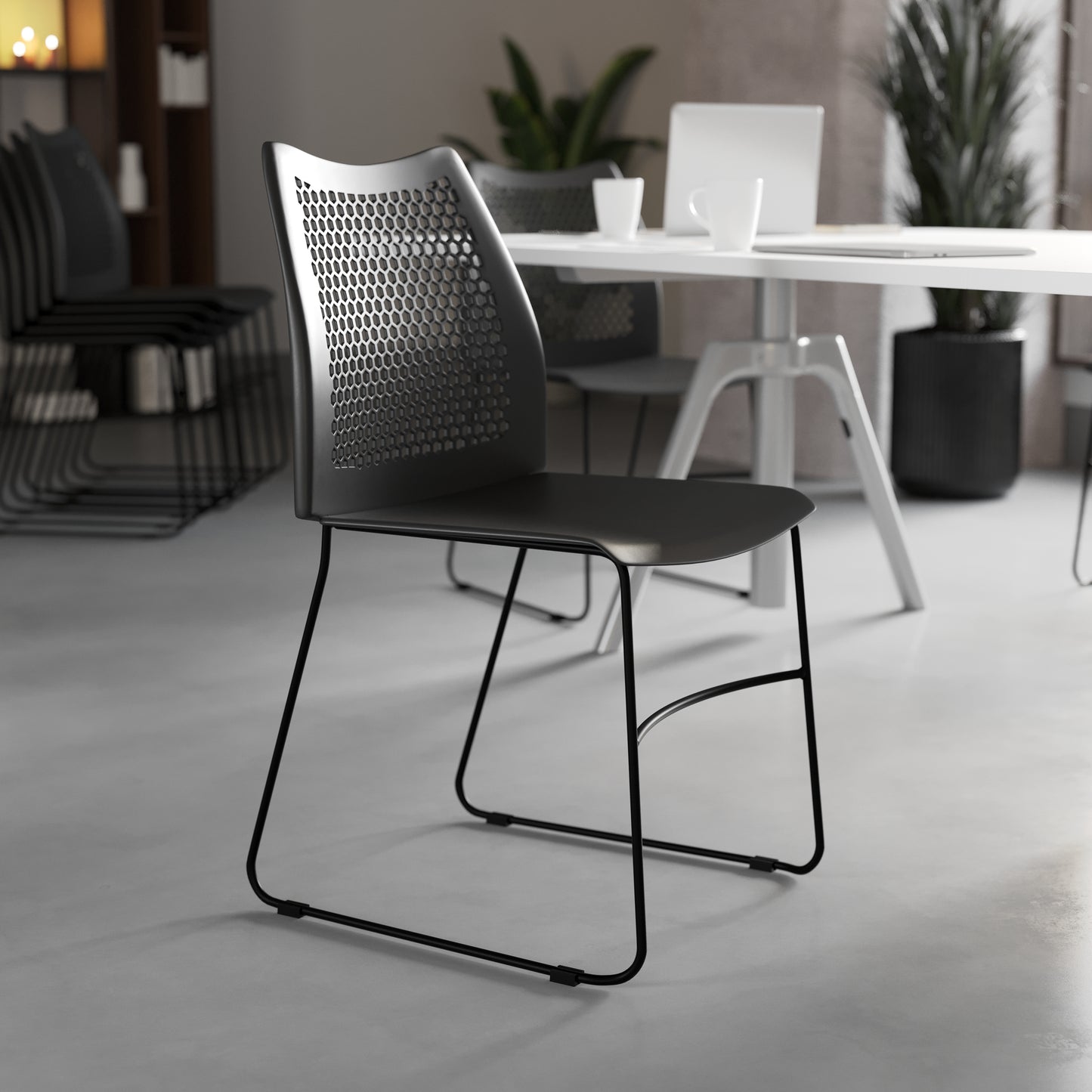 HERCULES Series 661 lb. Capacity Black Stack Chair with Air-Vent Back and Black Powder Coated Sled Base Black