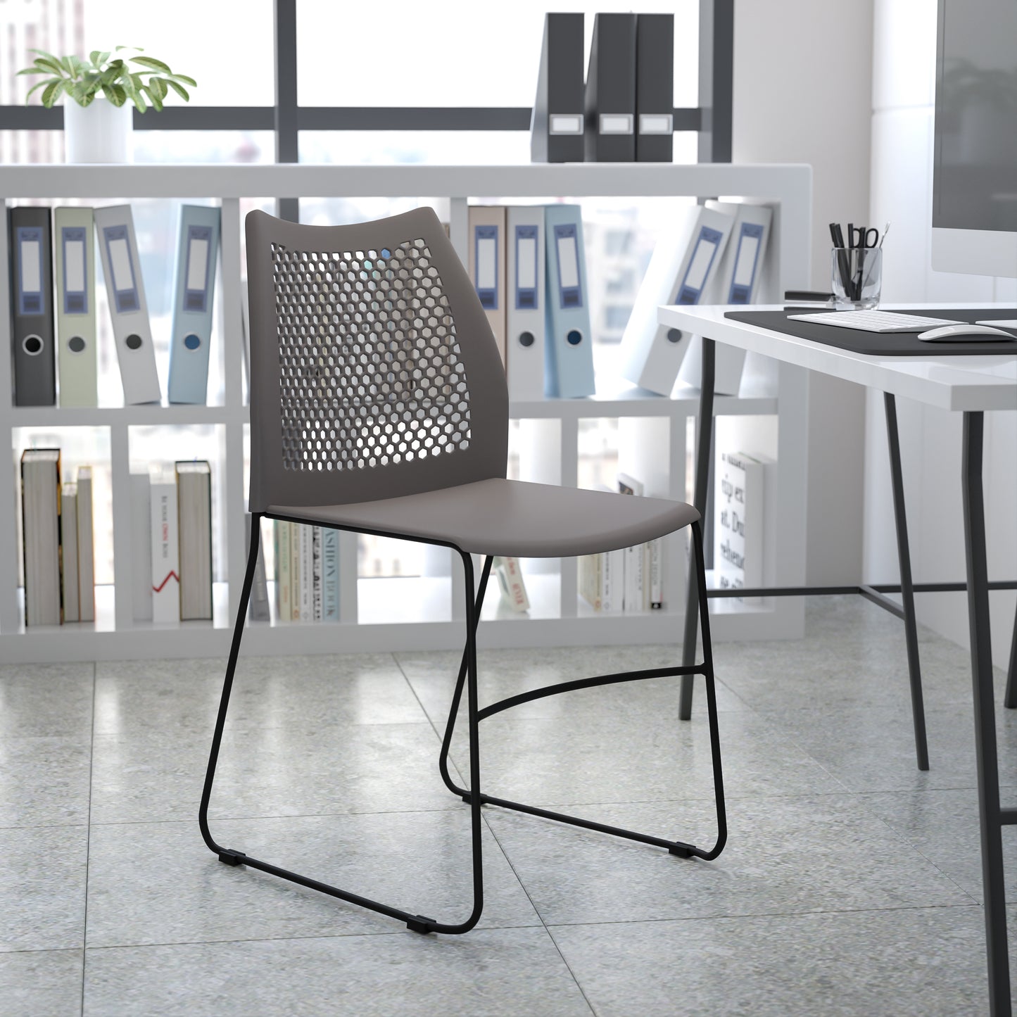 HERCULES Series 661 lb. Capacity Gray Stack Chair with Air-Vent Back and Black Powder Coated Sled Base Gray