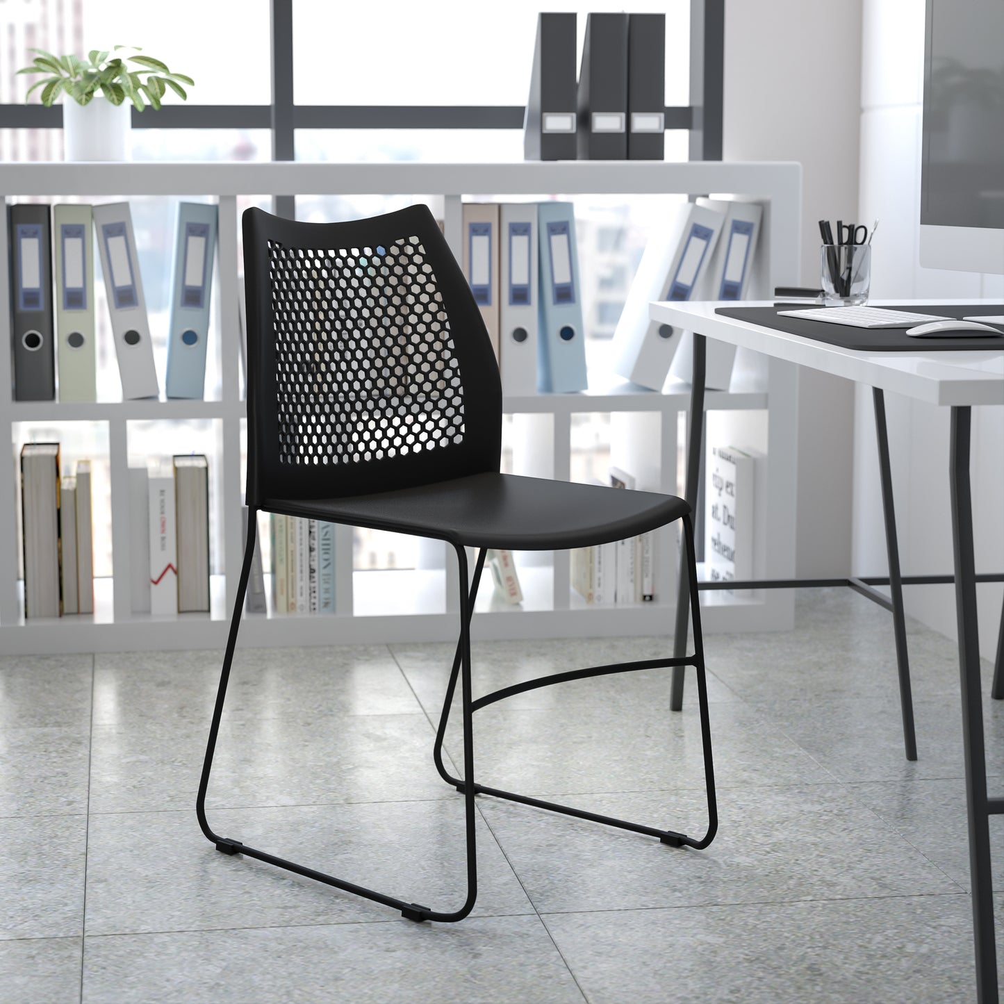 HERCULES Series 661 lb. Capacity Navy Stack Chair with Air-Vent Back and Gray Powder Coated Sled Base Navy