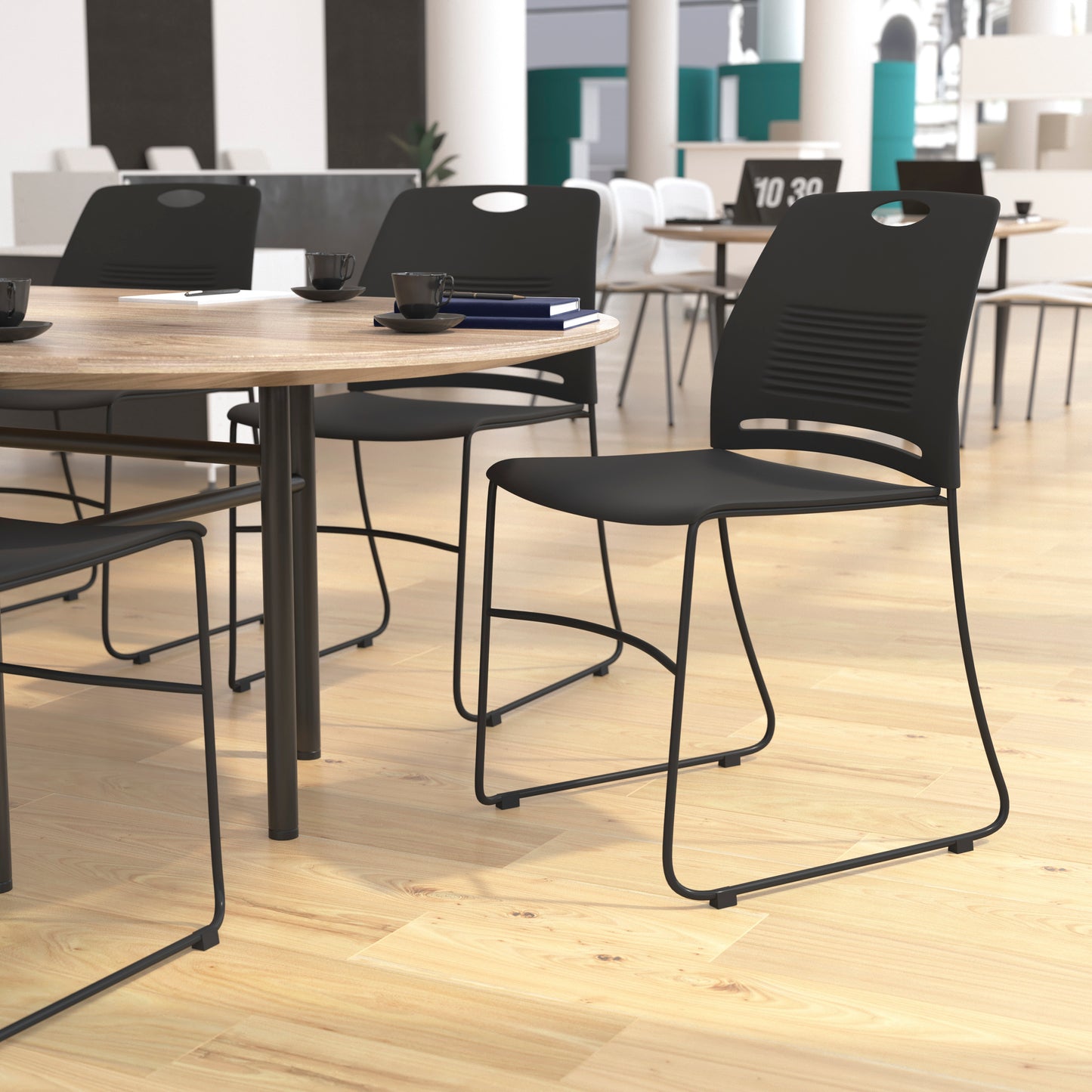 HERCULES Series Commercial Grade 660 lb. Capacity Black Plastic Stack Chair with Black Powder Coated Sled Base Frame and Integrated Carrying Handle Black
