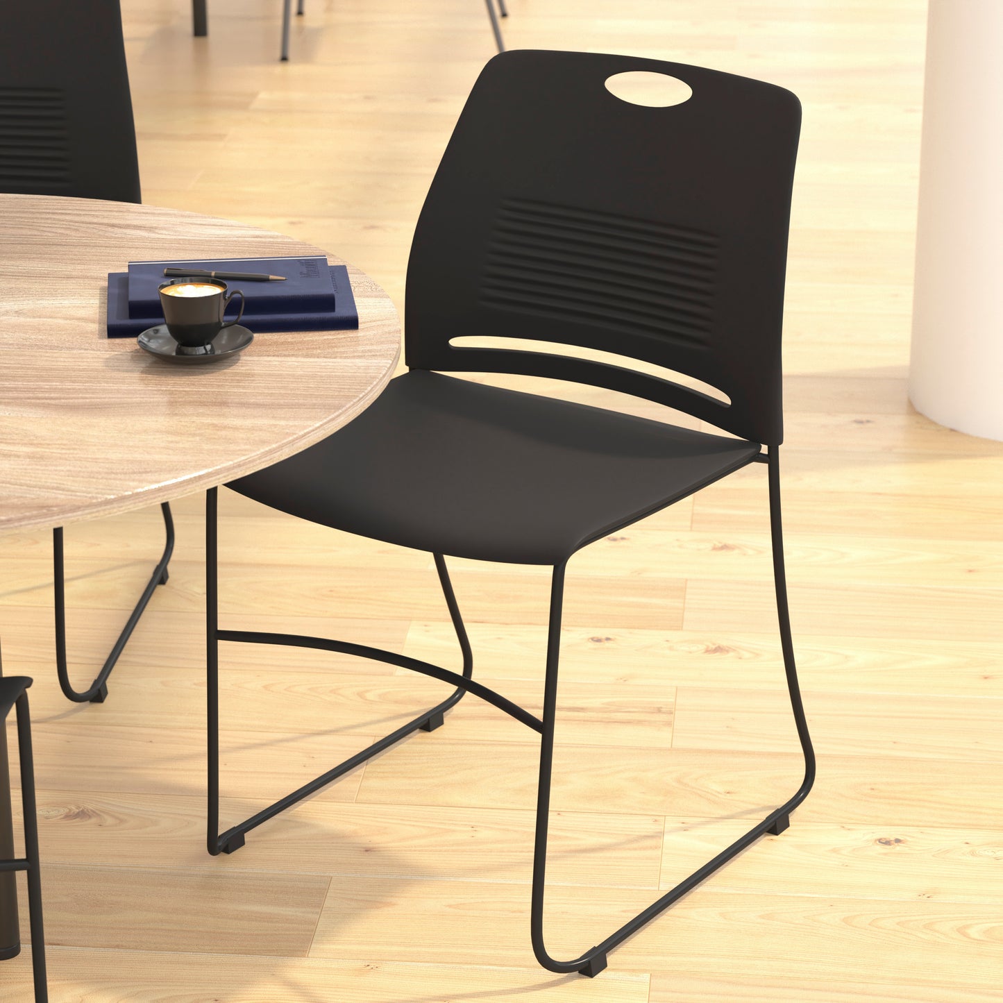 HERCULES Series Commercial Grade 660 lb. Capacity Black Plastic Stack Chair with Black Powder Coated Sled Base Frame and Integrated Carrying Handle Black