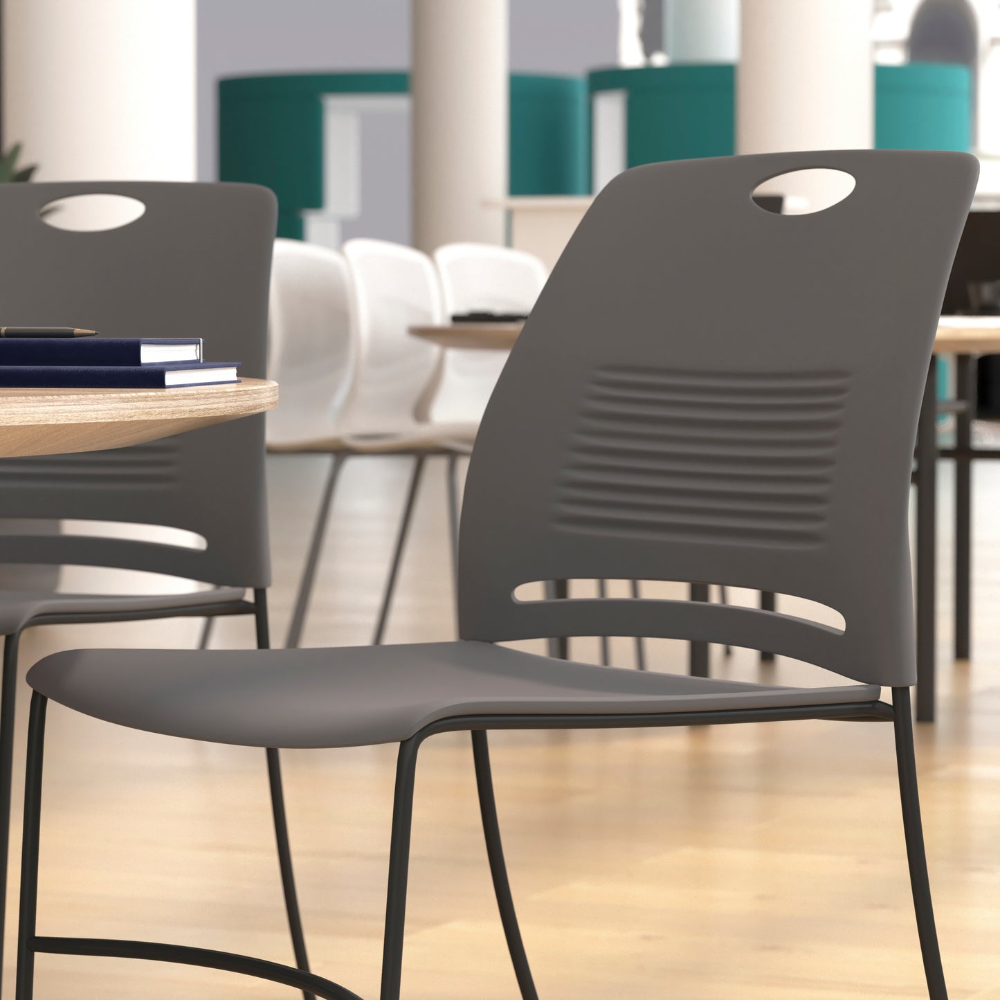 HERCULES Series Commercial Grade 660 lb. Capacity Gray Plastic Stack Chair with Black Powder Coated Sled Base Frame and Integrated Carrying Handle Gray