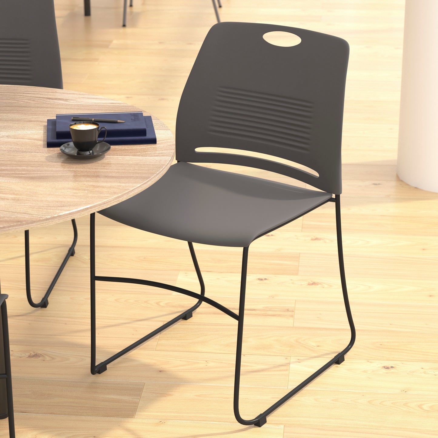 HERCULES Series Commercial Grade 660 lb. Capacity Gray Plastic Stack Chair with Black Powder Coated Sled Base Frame and Integrated Carrying Handle Gray