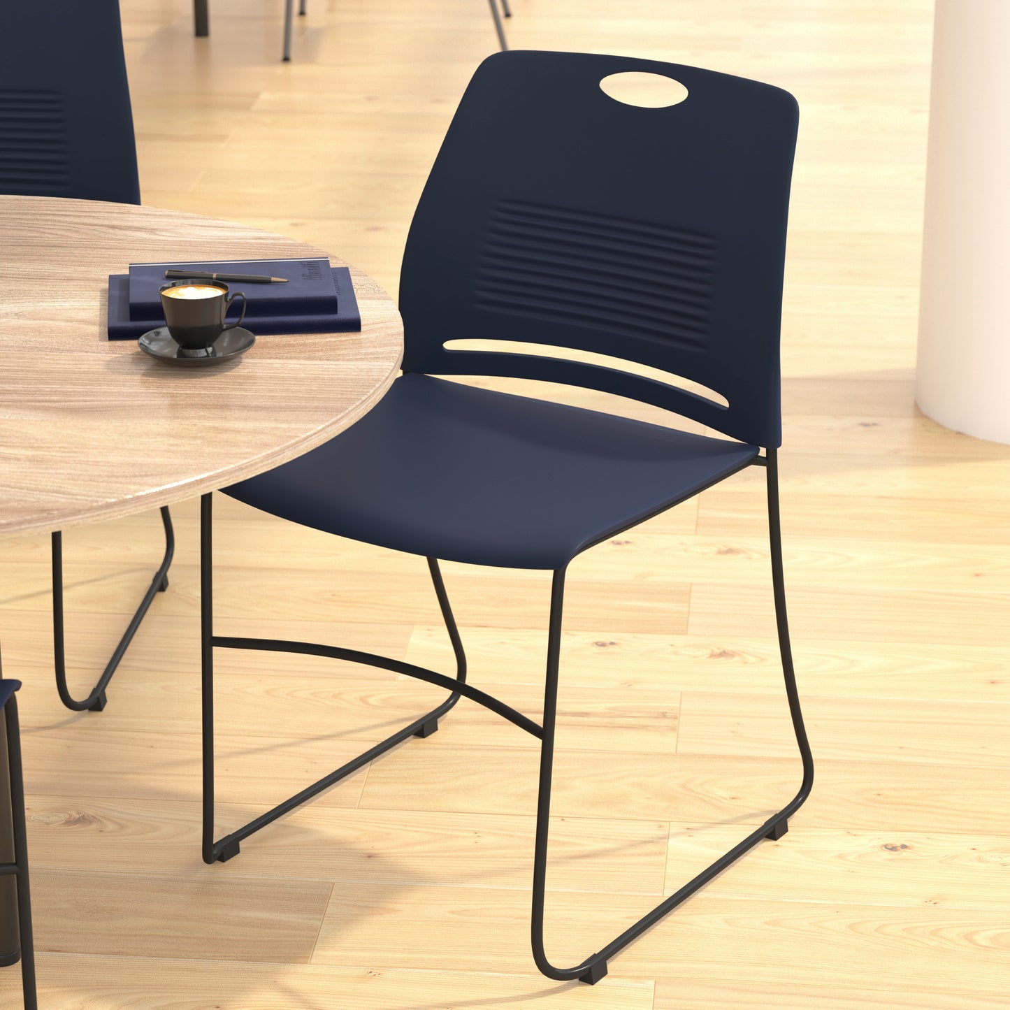 HERCULES Series Commercial Grade 660 lb. Capacity Navy Plastic Stack Chair with Black Powder Coated Sled Base Frame and Integrated Carrying Handle Navy