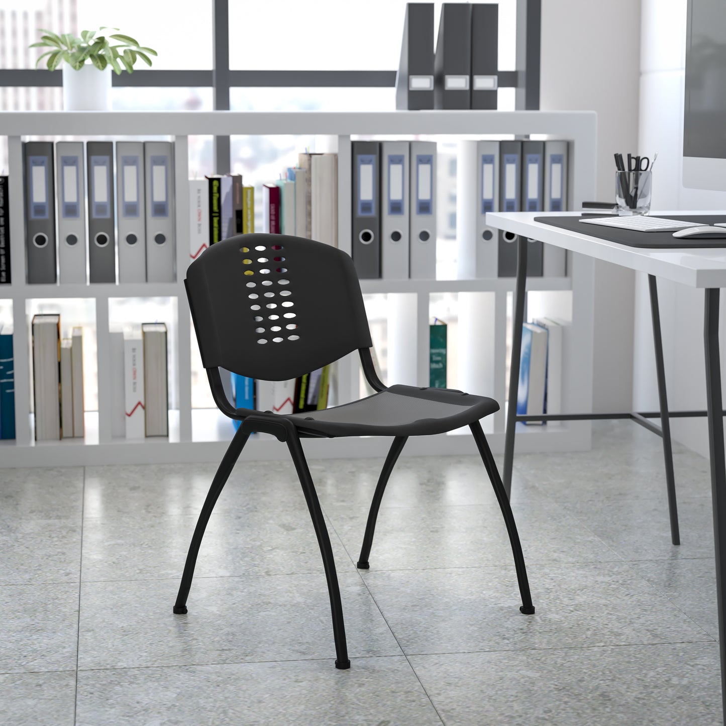 HERCULES Series 880 lb. Capacity Black Plastic Stack Chair with Oval Cutout Back and Black Frame Black