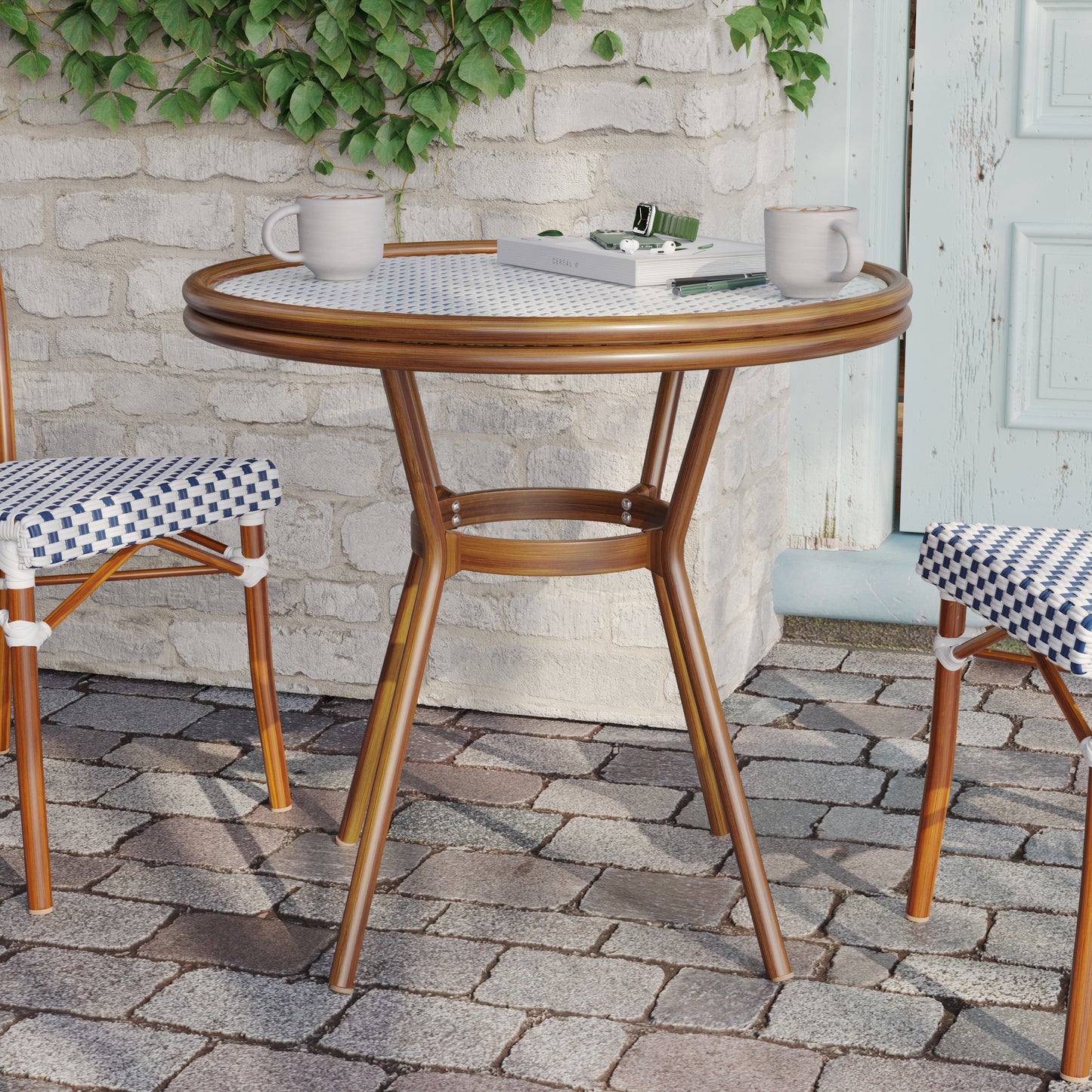 Lourdes Indoor/Outdoor Commercial Bistro 31.5" Table, White and Navy PE Rattan, Glass Top, Bamboo Print Aluminum Frame in Natural White & Navy Rattan/Natural Frame
