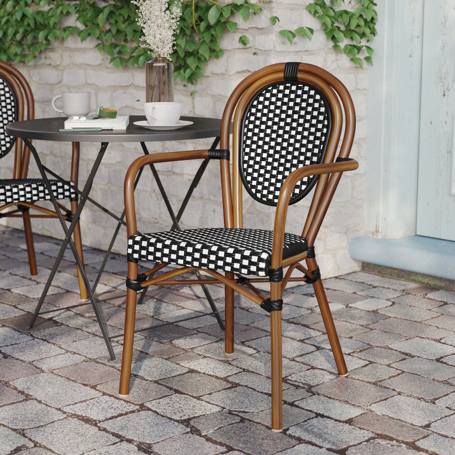 Lourdes Indoor/Outdoor Commercial Thonet Bistro Stacking Chair with Arms, Black and White PE Rattan and Bamboo Print Aluminum Frame Black & White/Natural Frame