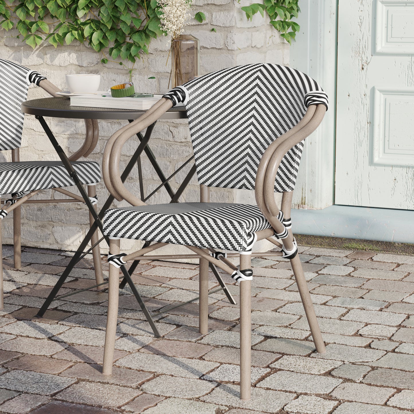 Marseille Indoor/Outdoor Commercial Bistro Stacking Chair with Arms, Black/White Textilene and Bamboo Print Aluminum Frame in LT Natural Black & White/Light Natural Frame