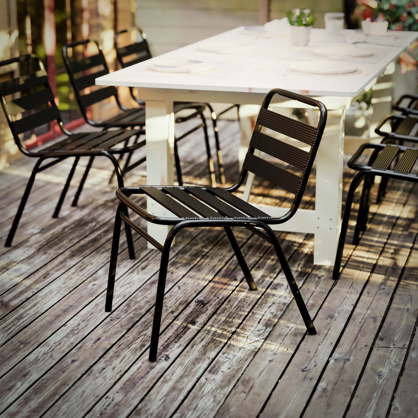 Lila Commercial Black Metal Indoor-Outdoor Restaurant Stack Chair with Metal Triple Slat Back Black