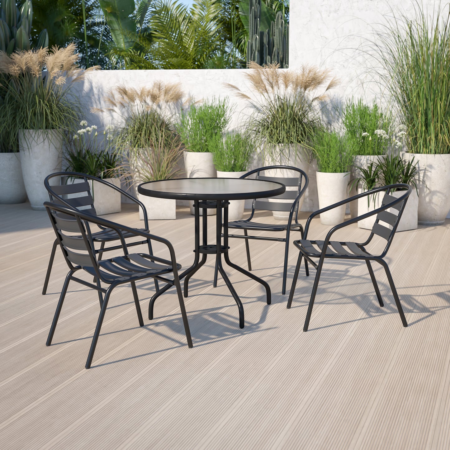 Lila 31.5'' Round Glass Metal Table with 4 Black Metal Aluminum Slat Stack Chairs Black
