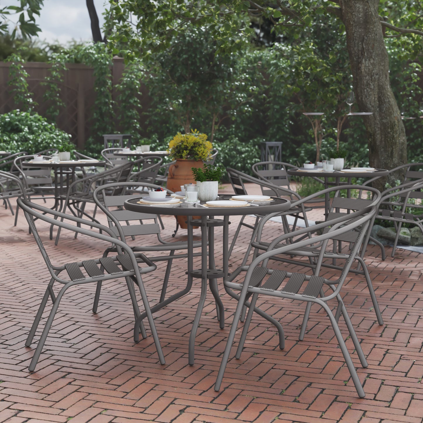 Lila 31.5'' Round Glass Top Metal Table with 4 Silver Aluminum Slat Stack Chairs Silver