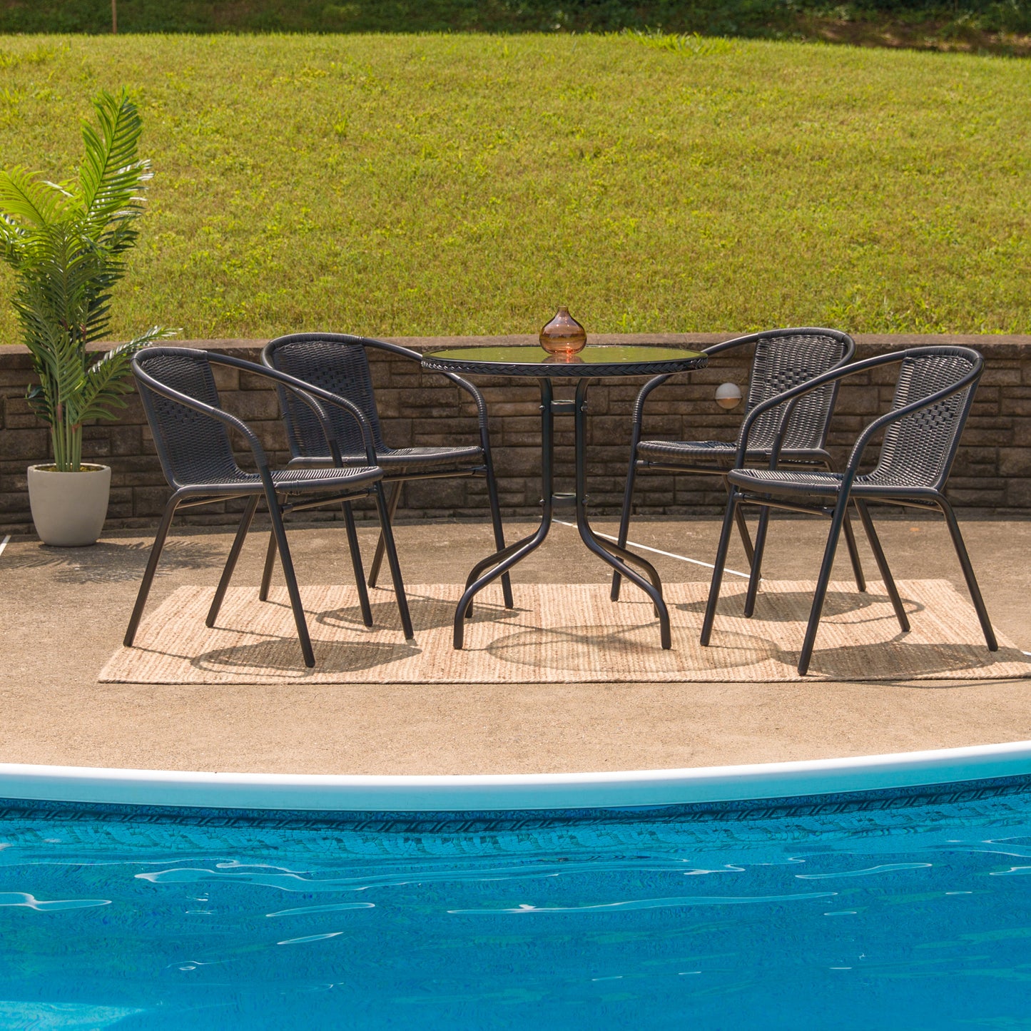 Lila 28'' Round Glass Metal Table with Black Rattan Edging and 4 Black Rattan Stack Chairs Black