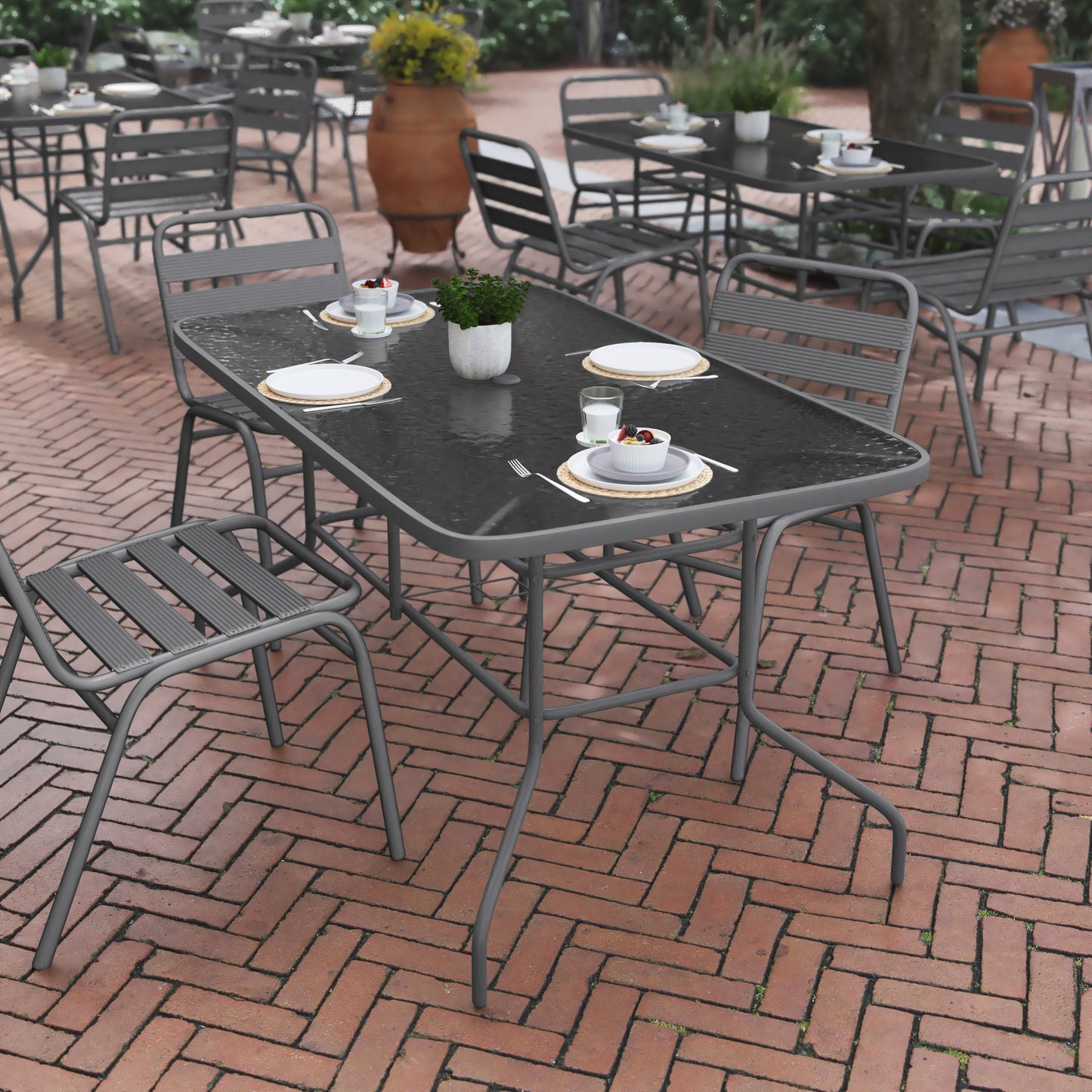 Tory 31.5" x 55" Silver Rectangular Tempered Glass Metal Table with Umbrella Hole Clear Top/Silver Frame