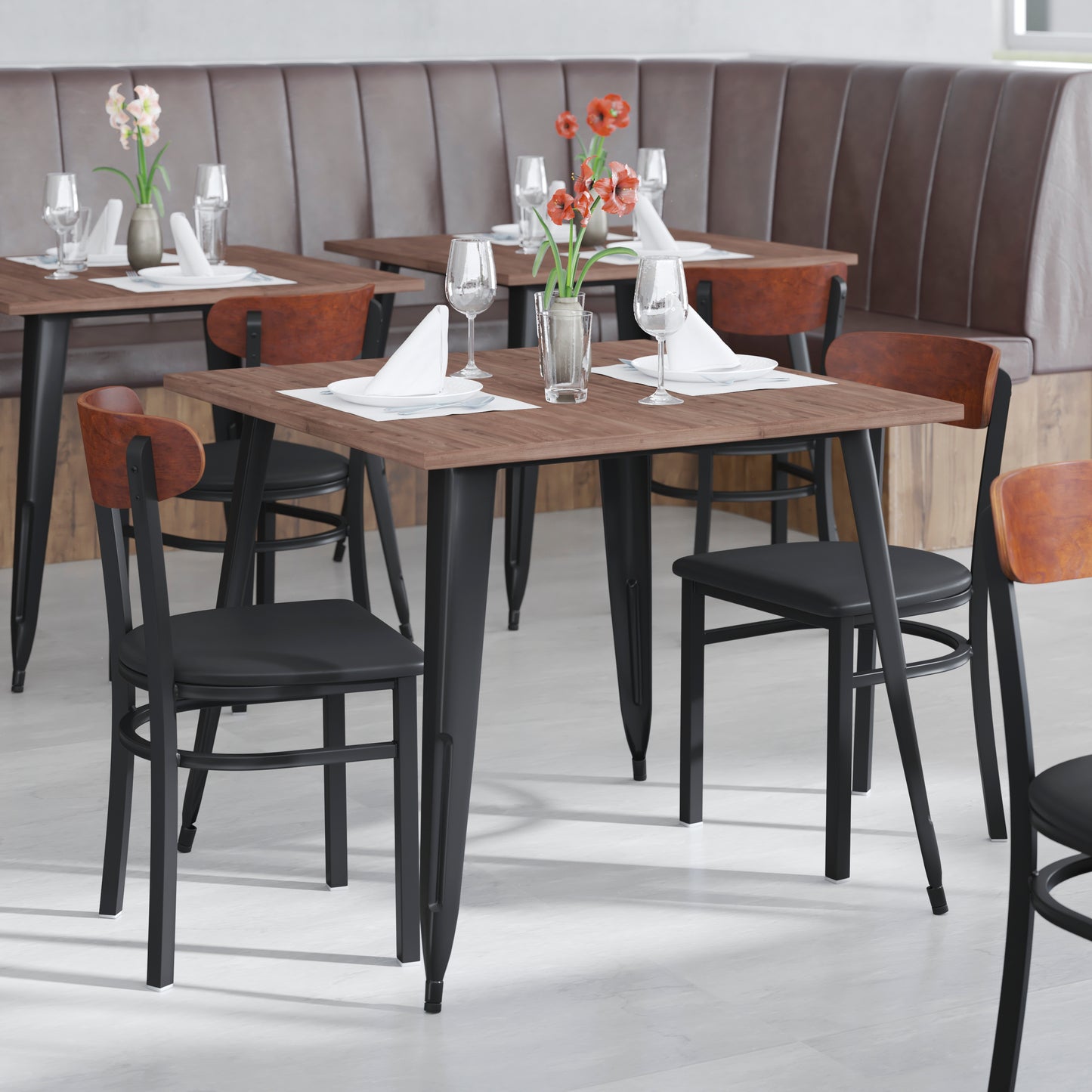 Wright Commercial Dining Chair with 500 LB. Capacity Black Steel Frame, Walnut Finish Wooden Boomerang Back, and Black Vinyl Seat Walnut Wood Back/Black Vinyl Seat