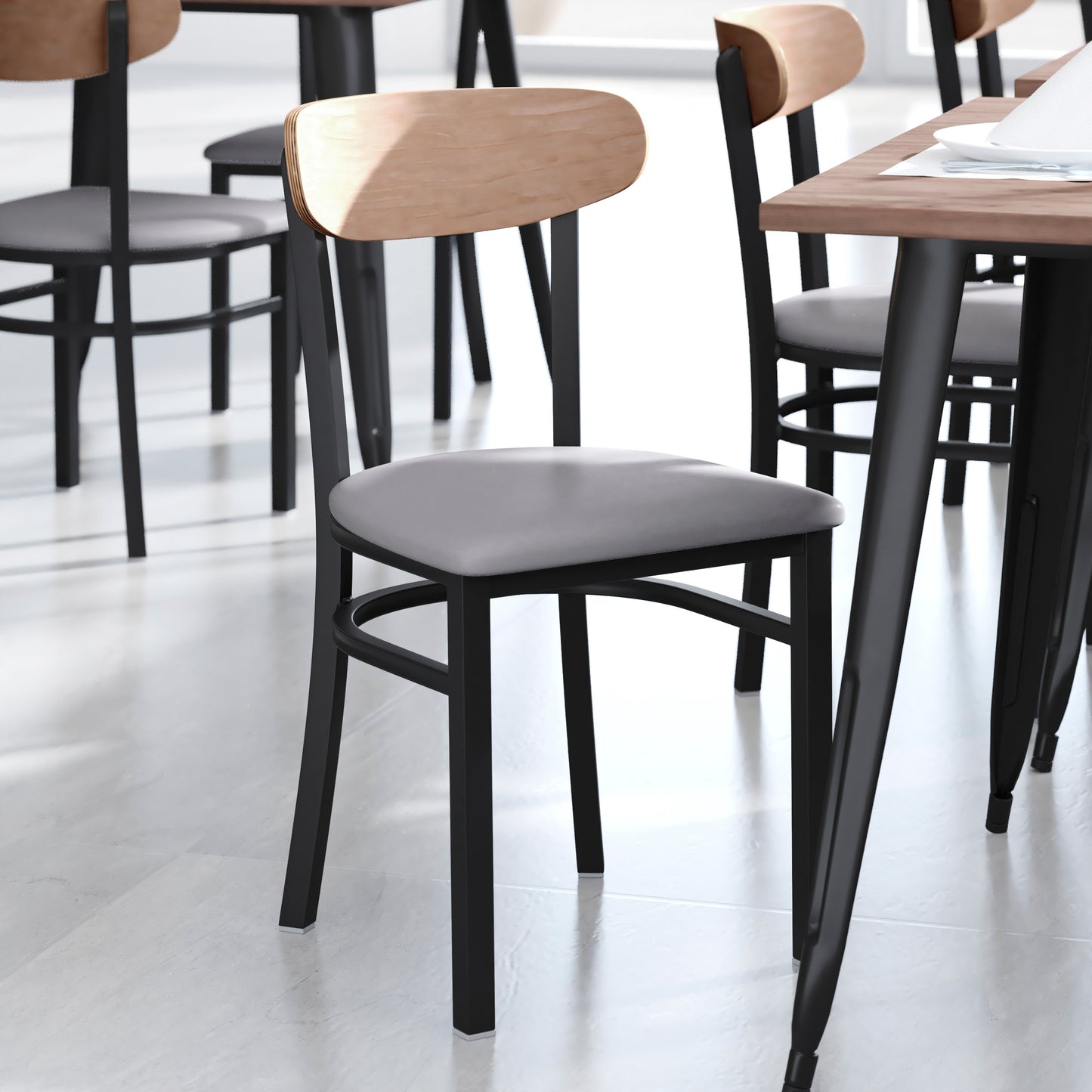 Wright Commercial Dining Chair with 500 LB. Capacity Black Steel Frame, Natural Birch Finish Wooden Boomerang Back, and Gray Vinyl Seat Natural Birch Wood Back/Gray Vinyl Seat